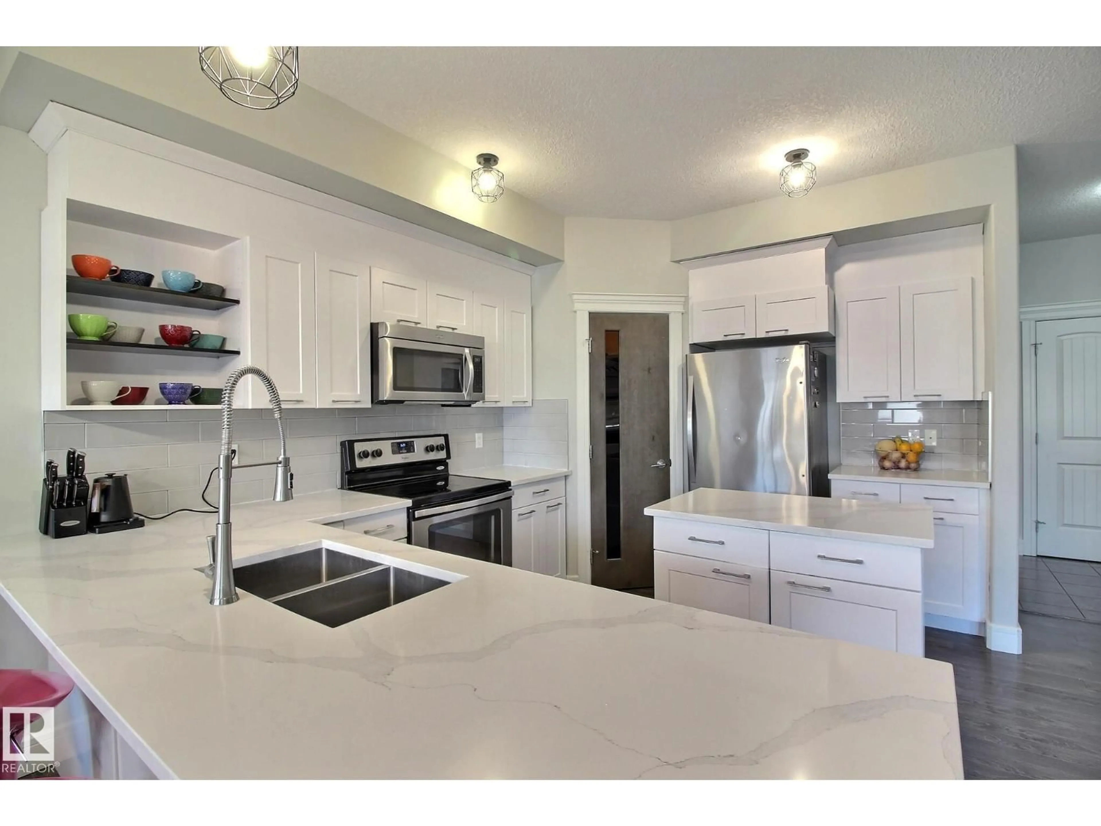 Open concept kitchen, ceramic/tile floor for 35 HUDSON CV, Spruce Grove Alberta T7X0R8