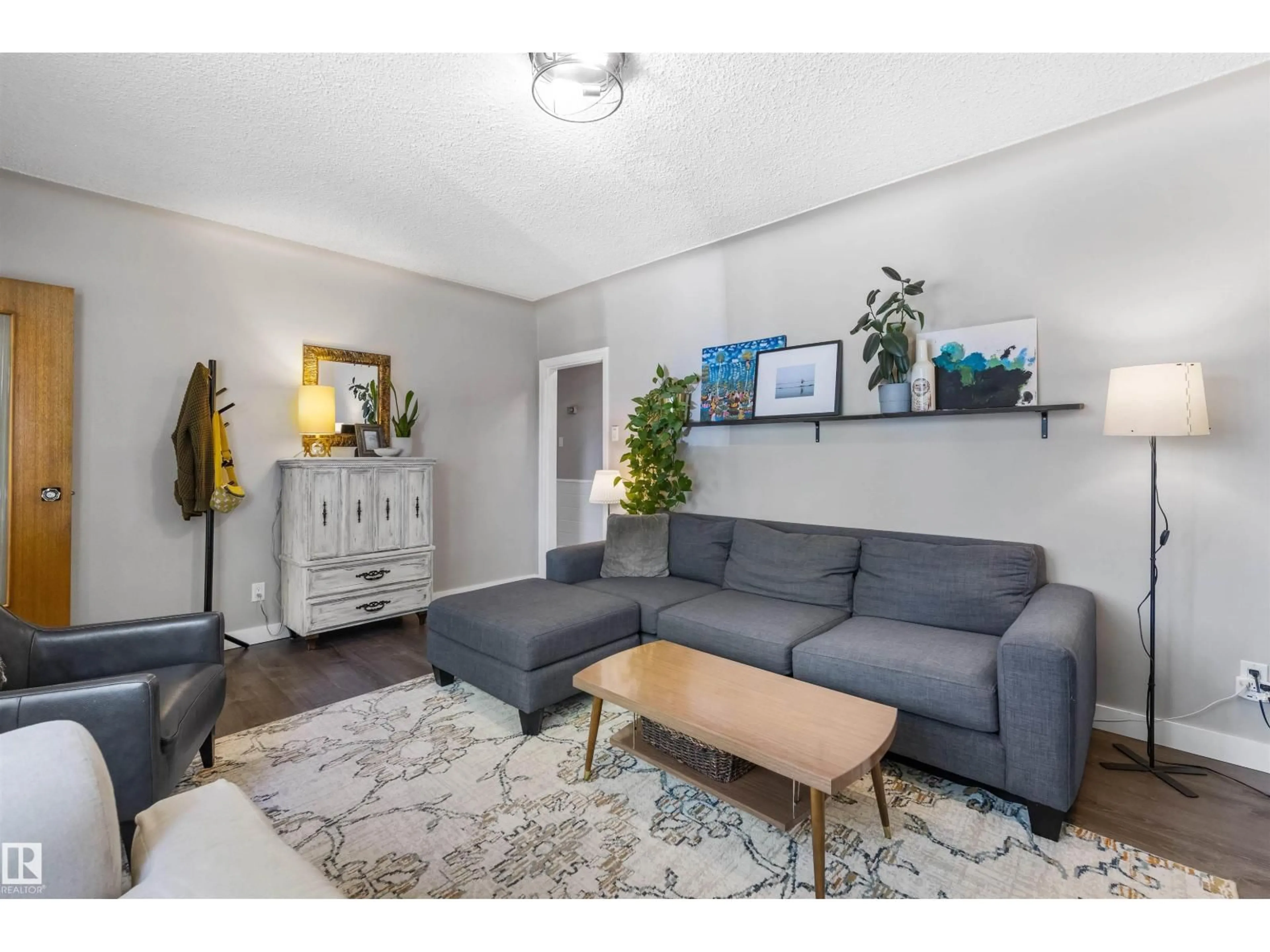 Living room with furniture, unknown for 9715 71 AV, Edmonton Alberta T6E0W5