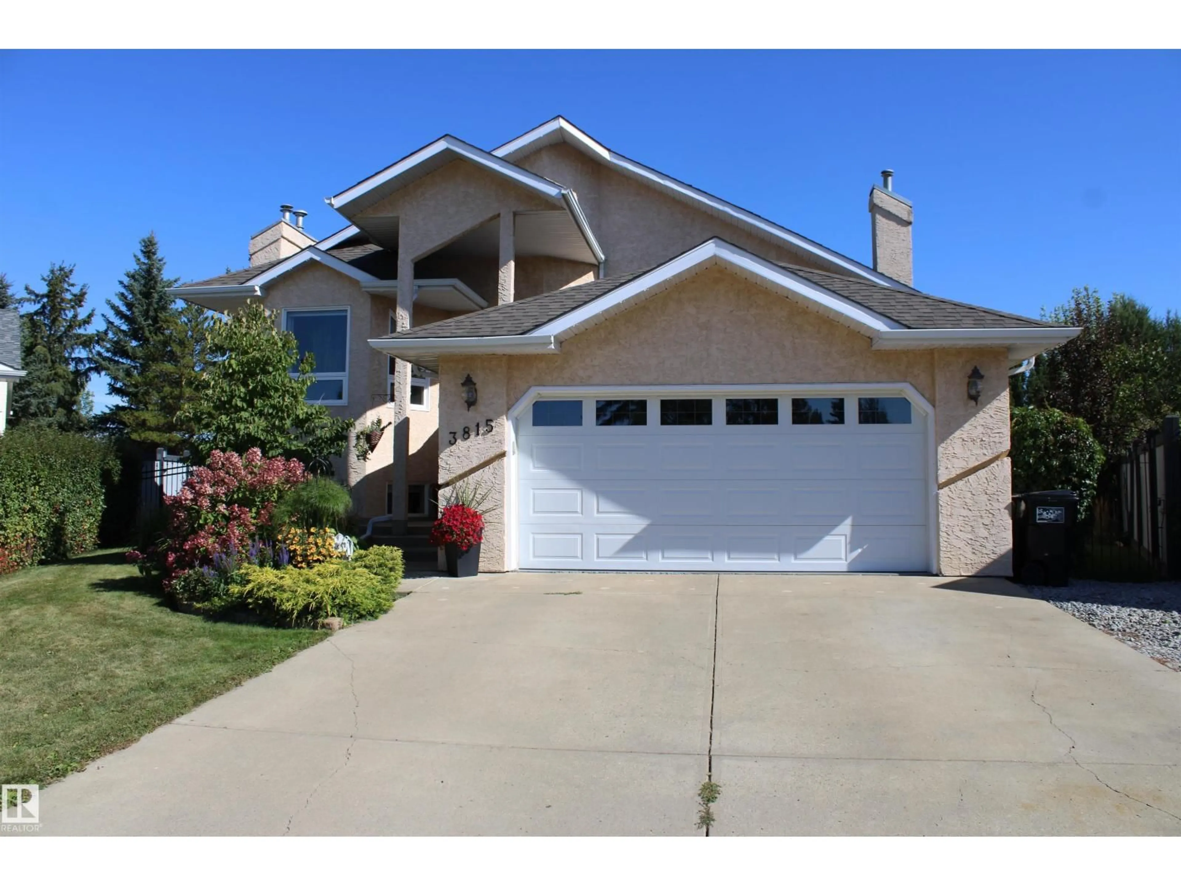 Home with vinyl exterior material, street for NW - 3815 41 ST, Edmonton Alberta T6L6R5