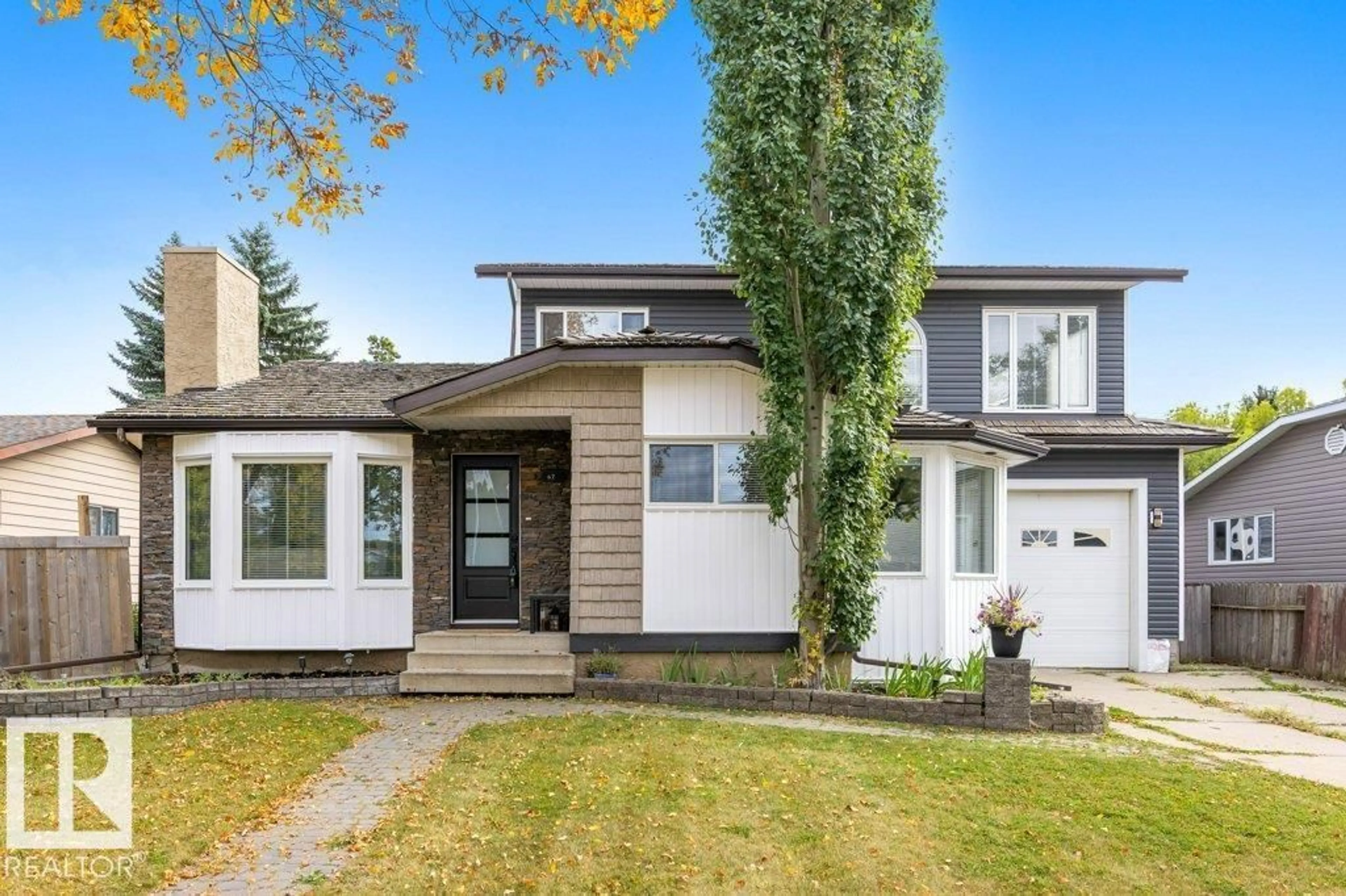 Home with vinyl exterior material, street for 67 ARLINGTON DR, St. Albert Alberta T8N2Z2
