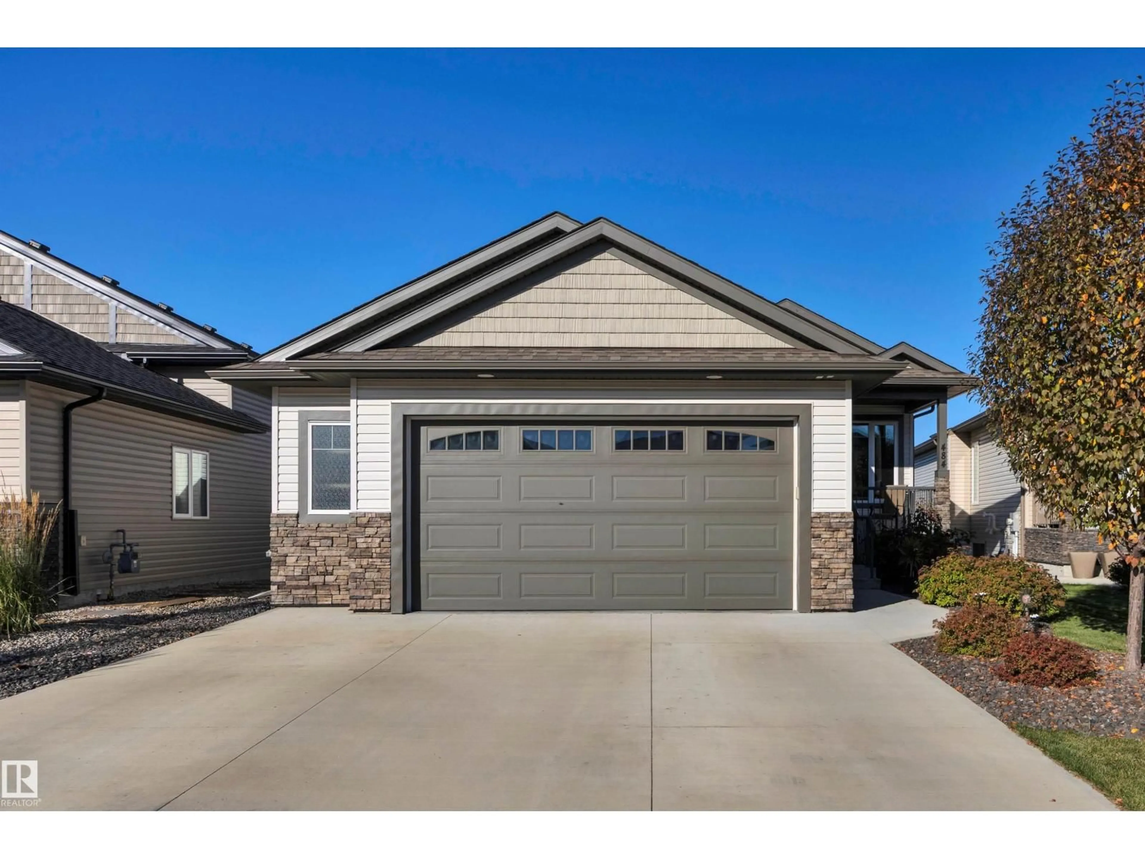 Home with vinyl exterior material, street for 484 ROBERTS CR, Leduc Alberta T9E1K9
