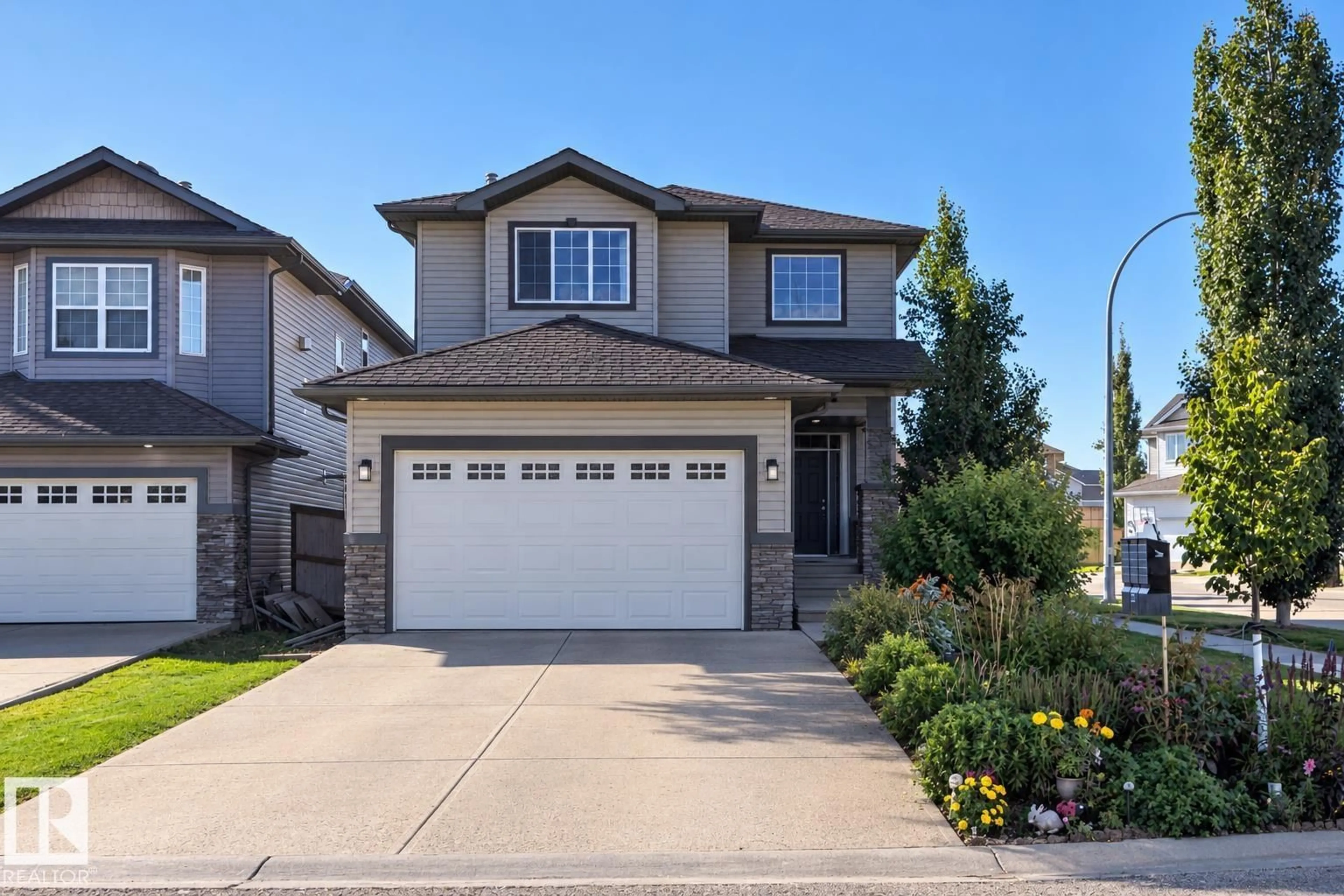 Home with vinyl exterior material, street for 141 ACACIA CI, Leduc Alberta T9E0C9
