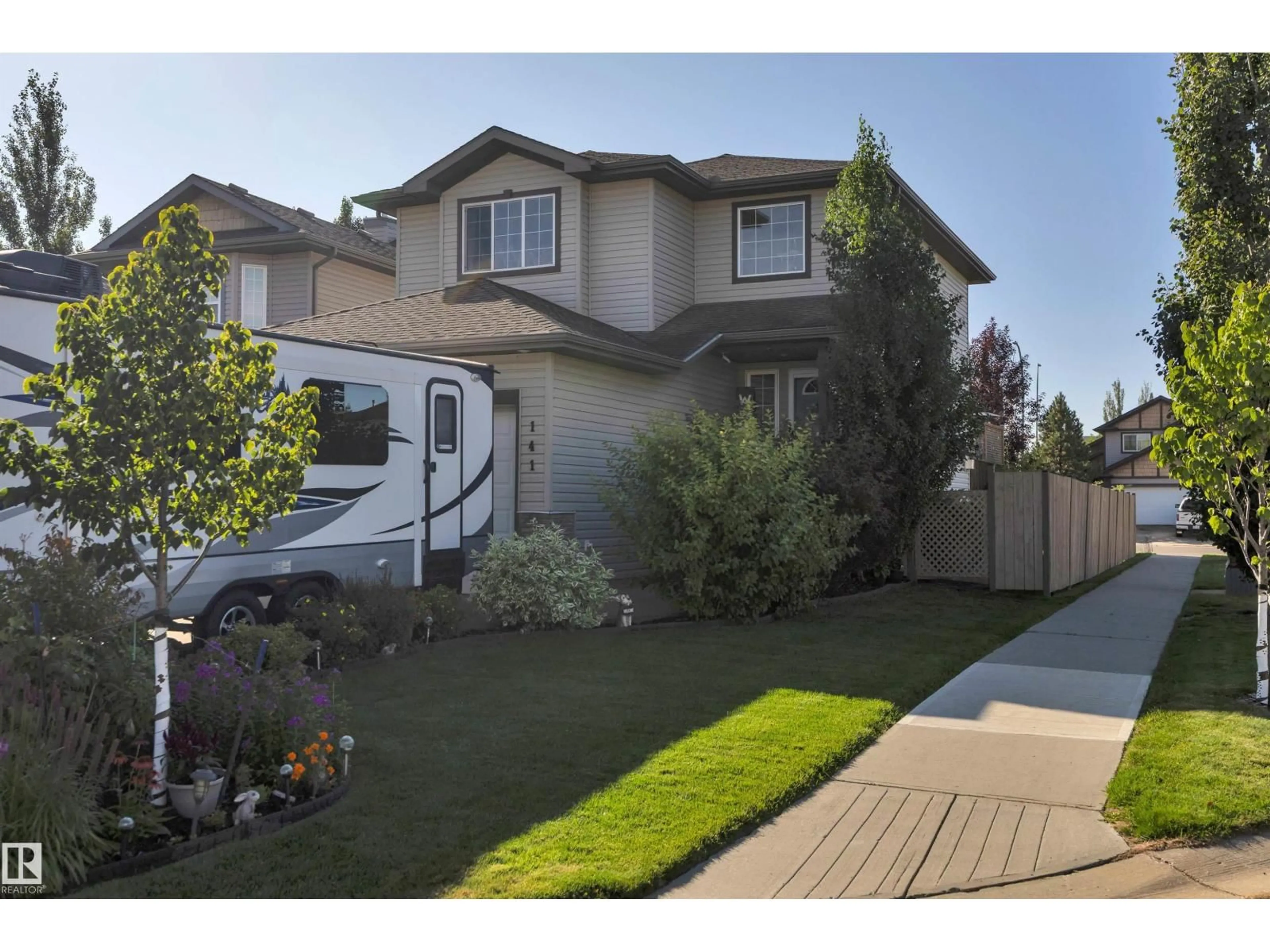 Home with vinyl exterior material, street for 141 ACACIA CI, Leduc Alberta T9E0C9
