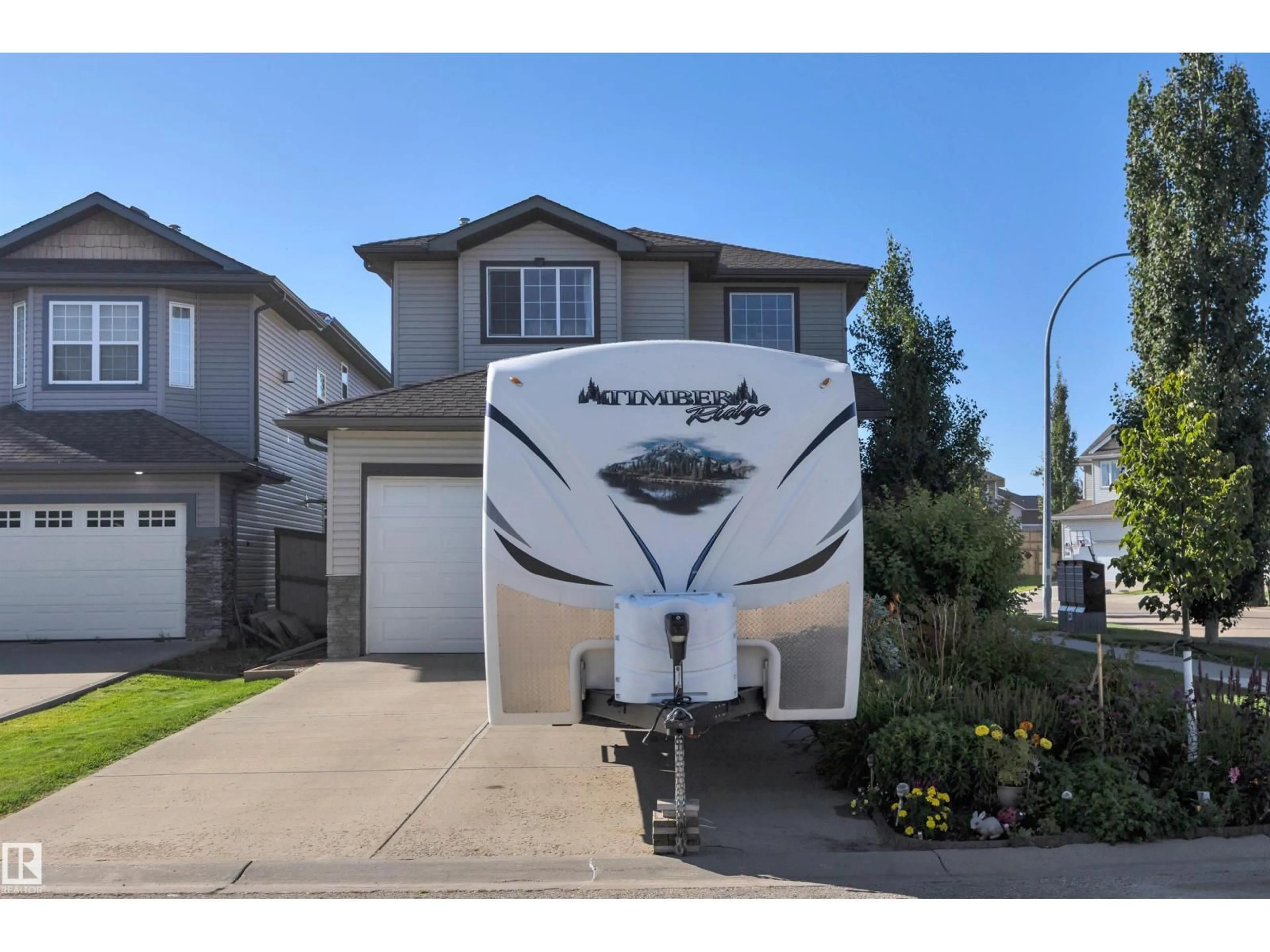 Home with vinyl exterior material, street for 141 ACACIA CI, Leduc Alberta T9E0C9