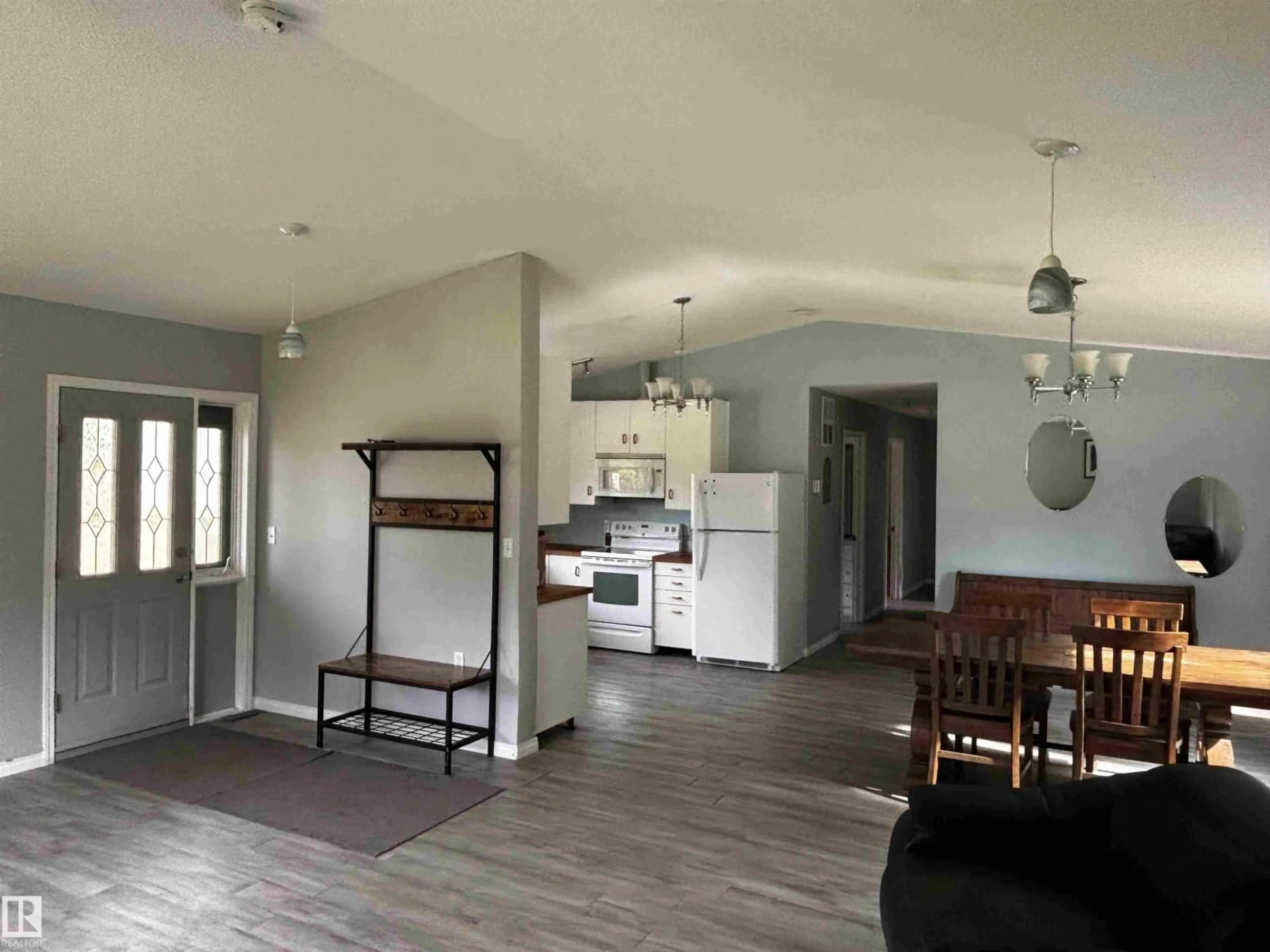 Open concept kitchen, wood/laminate floor for 55029 HWY 761, Rural Wetaskiwin County Alberta T0C0T0
