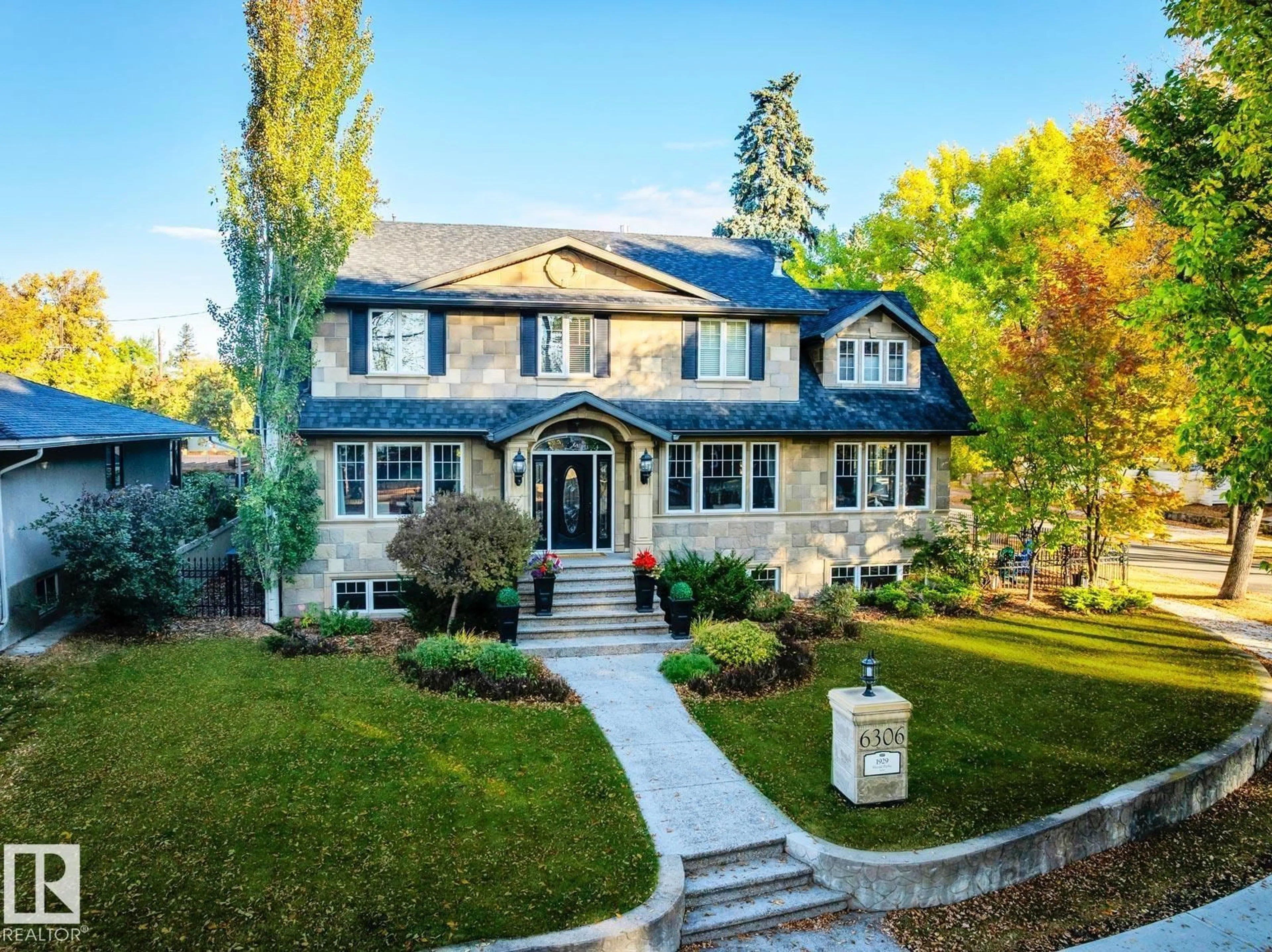 Home with brick exterior material, street for 6306 111 AV, Edmonton Alberta T5W0L5