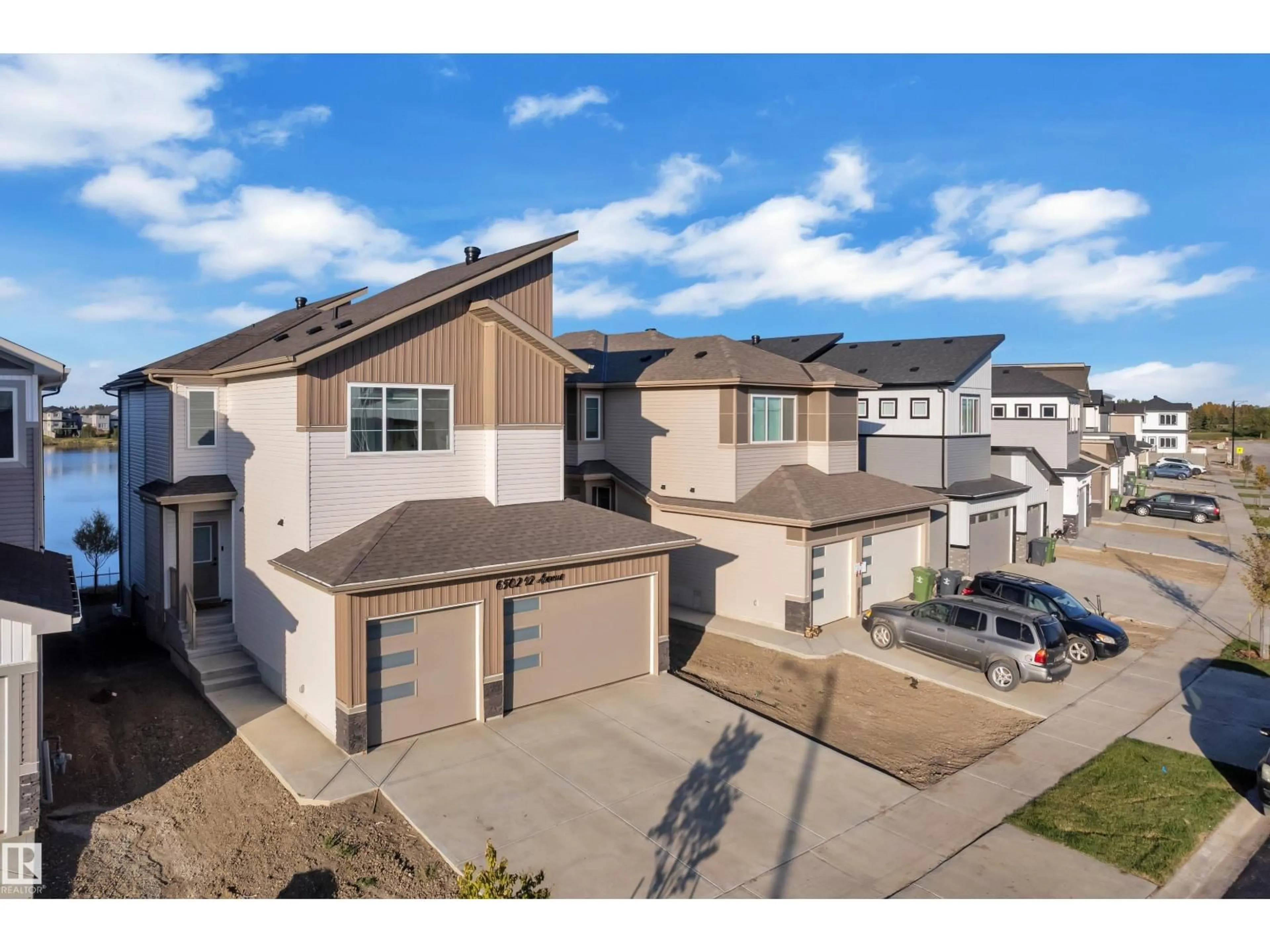 A pic from outside/outdoor area/front of a property/back of a property/a pic from drone, street for 6502 42 AVE, Beaumont Alberta T4X3E8