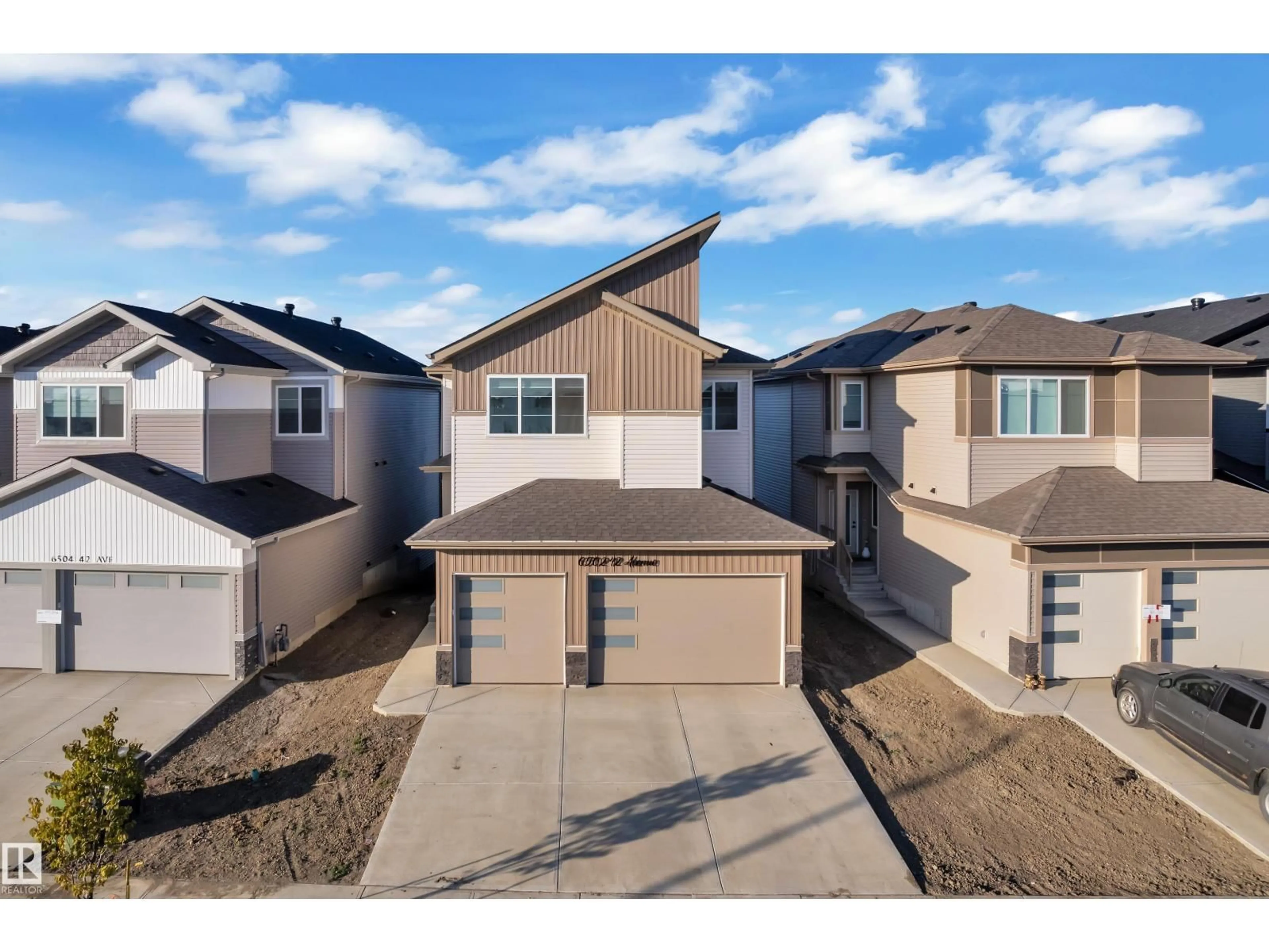 A pic from outside/outdoor area/front of a property/back of a property/a pic from drone, street for 6502 42 AVE, Beaumont Alberta T4X3E8
