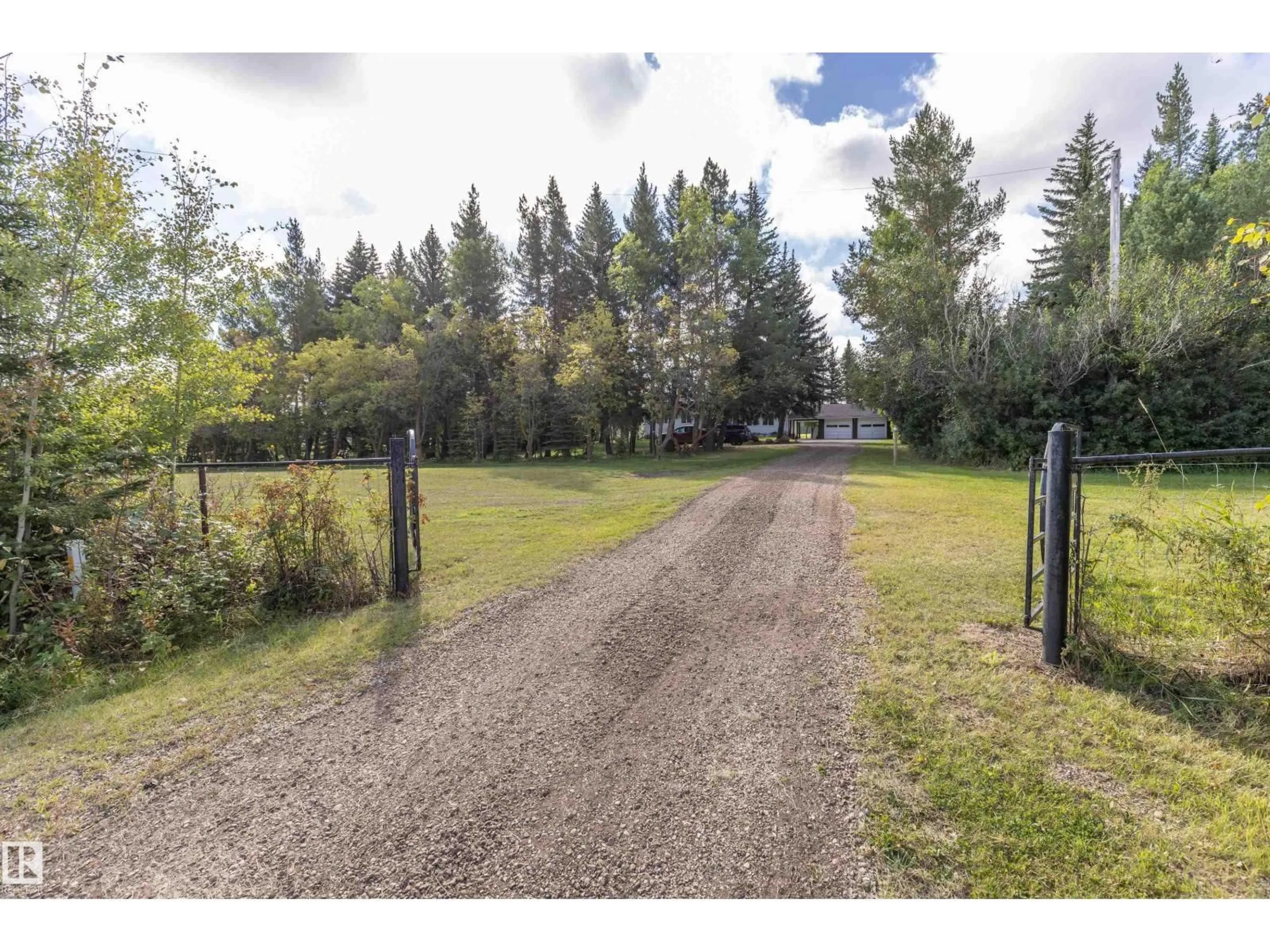 A pic from outside/outdoor area/front of a property/back of a property/a pic from drone, forest/trees view for 21557 WYE RD, Rural Strathcona County Alberta T8E2J2