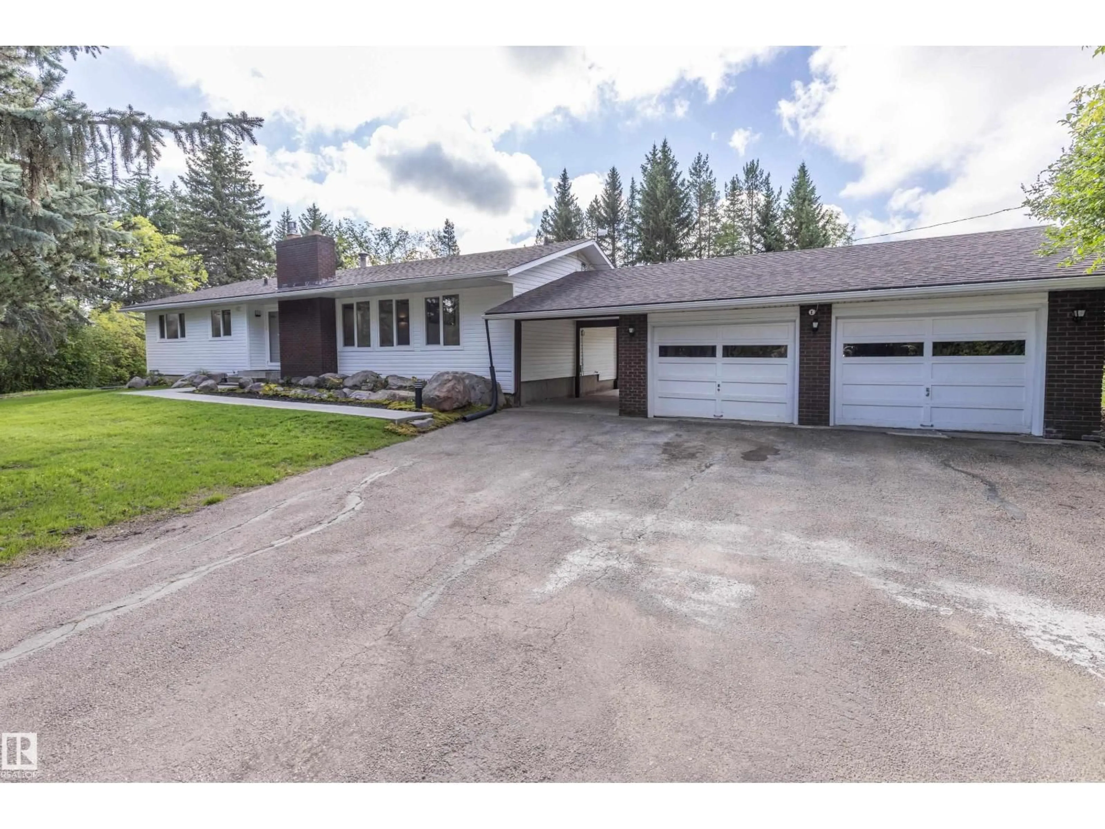 A pic from outside/outdoor area/front of a property/back of a property/a pic from drone, street for 21557 WYE RD, Rural Strathcona County Alberta T8E2J2