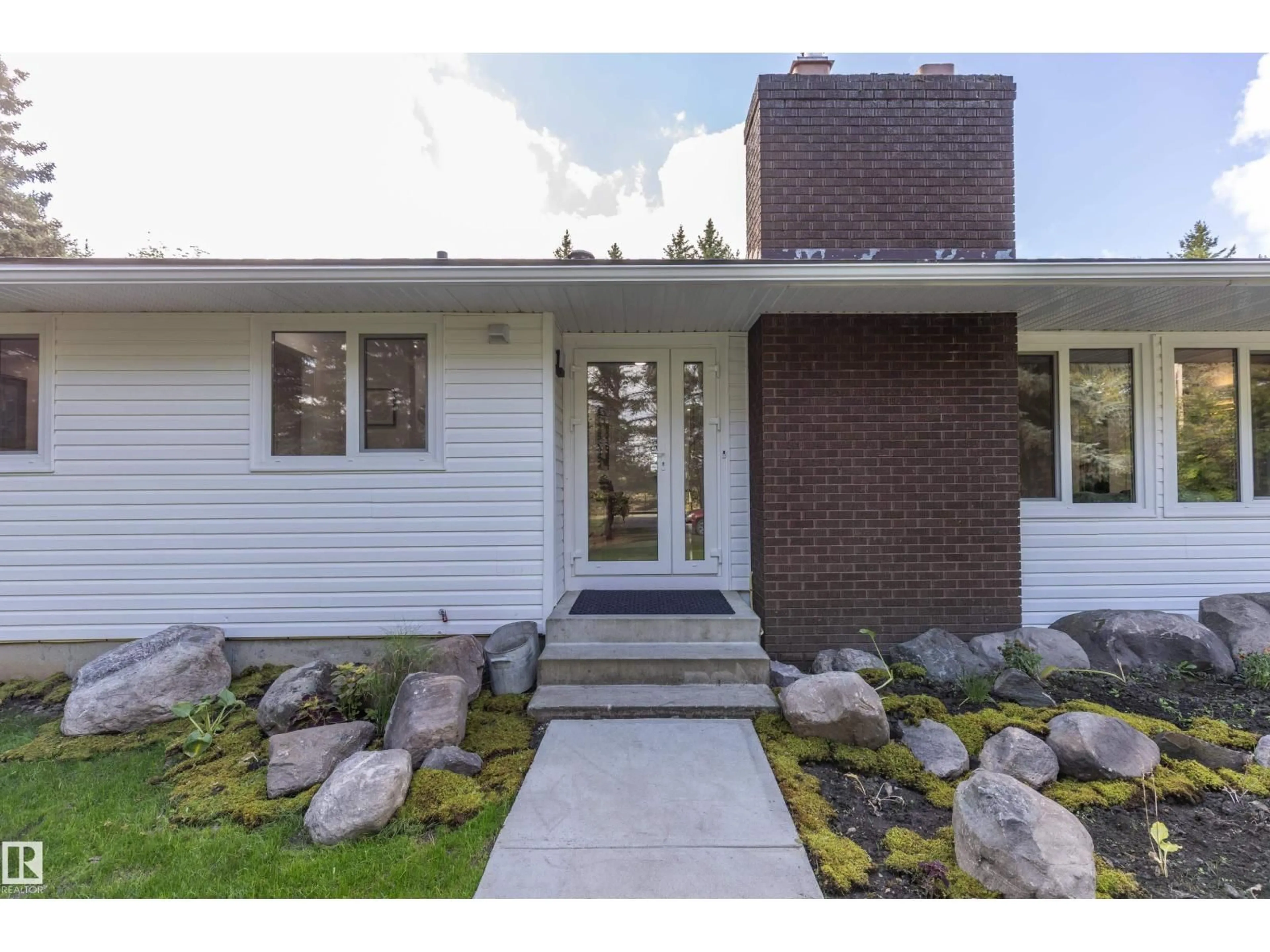 Home with brick exterior material, street for 21557 WYE RD, Rural Strathcona County Alberta T8E2J2