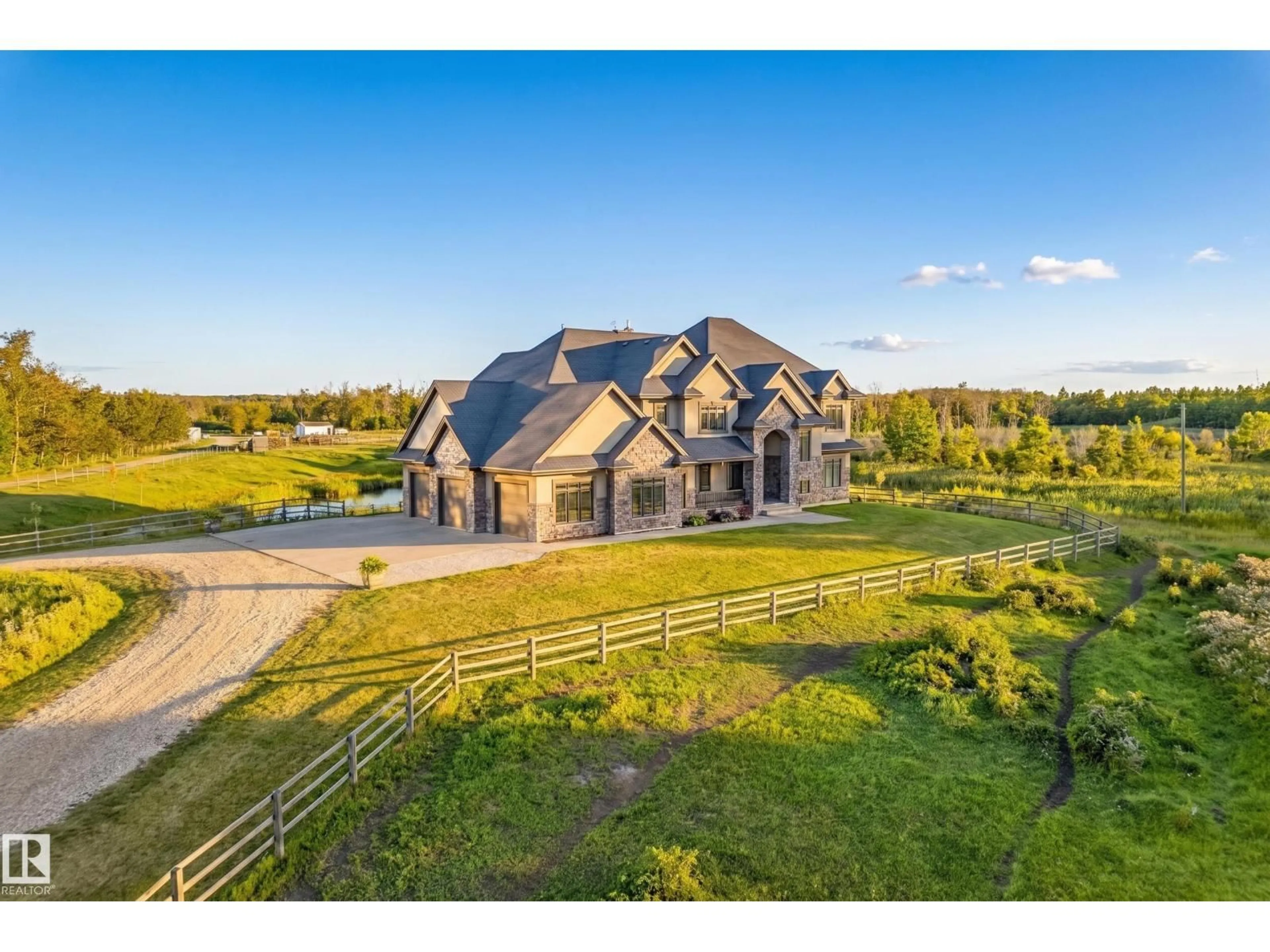 A pic from outside/outdoor area/front of a property/back of a property/a pic from drone, unknown for 530010 RR 195, Rural Lamont County Alberta T0B4J0