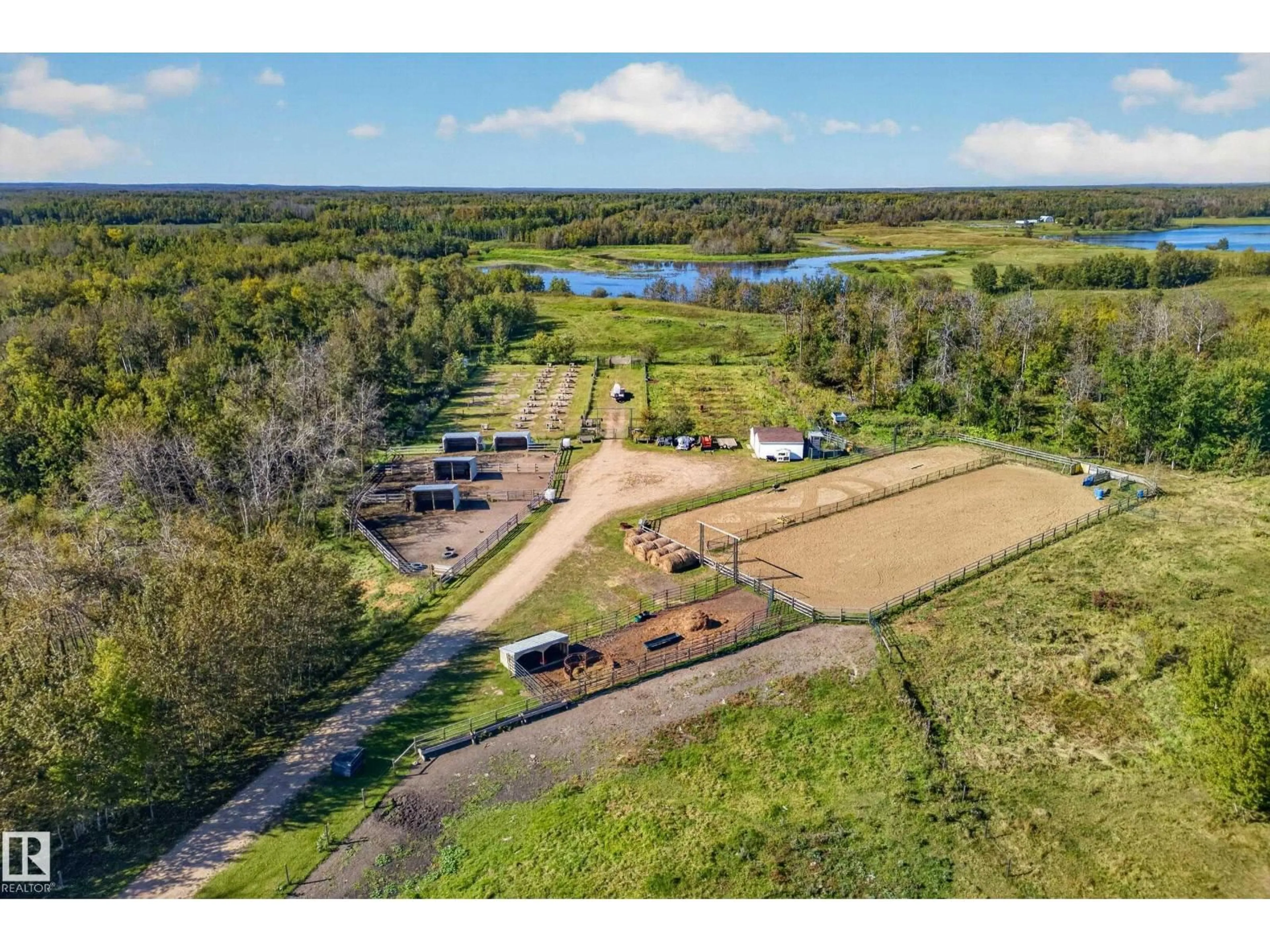 A pic from outside/outdoor area/front of a property/back of a property/a pic from drone, water/lake/river/ocean view for 530010 RR 195, Rural Lamont County Alberta T0B4J0