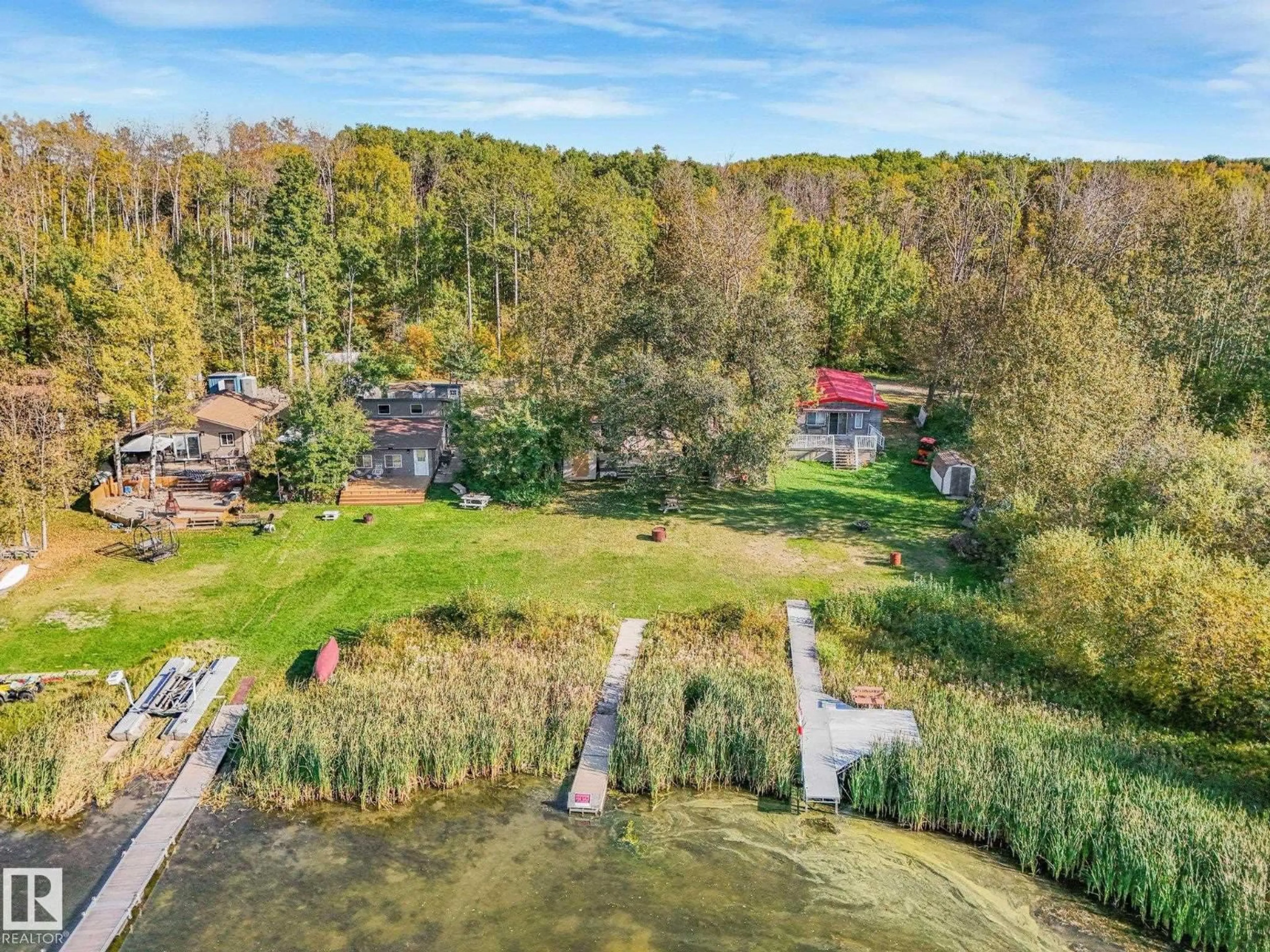 A pic from outside/outdoor area/front of a property/back of a property/a pic from drone, water/lake/river/ocean view for 52220 HWY 770, Rural Parkland County Alberta T0E0H0