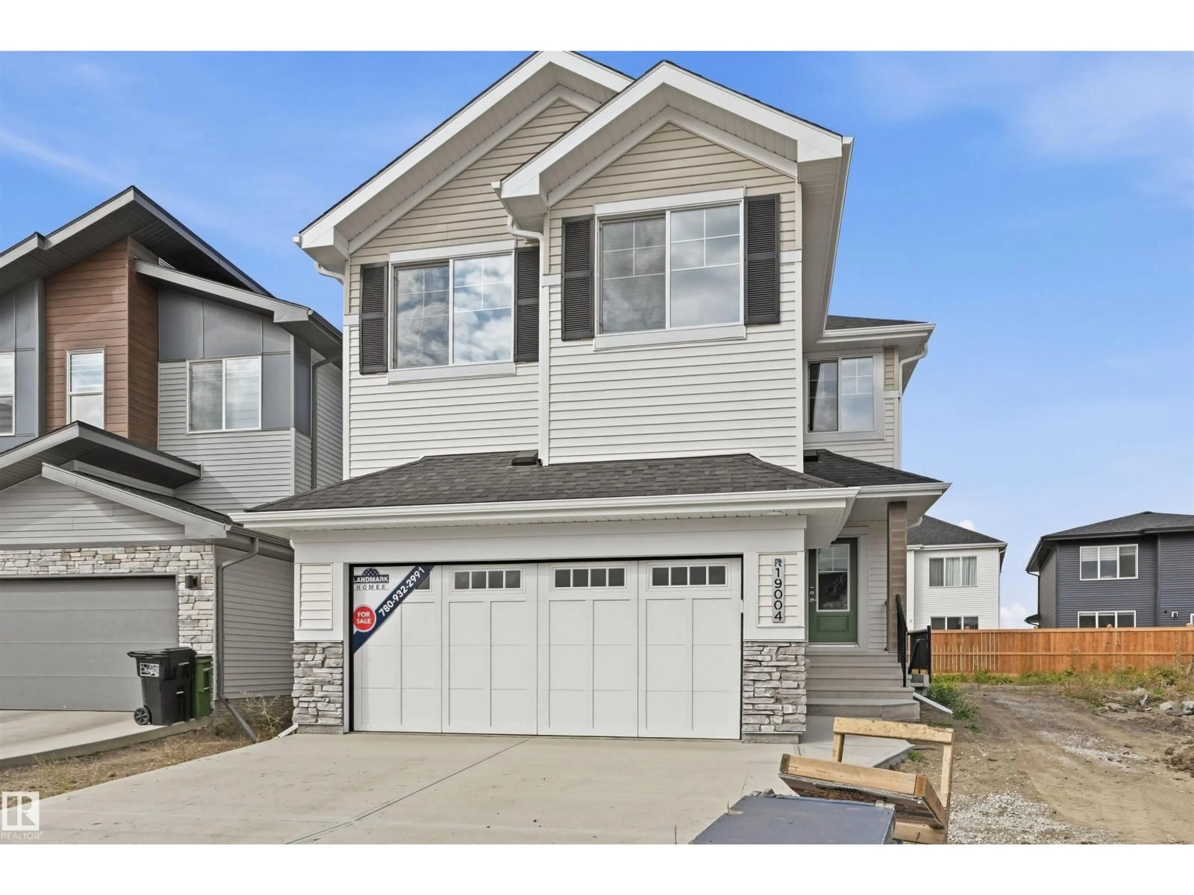 Home with vinyl exterior material, street for 19004 20 AV, Edmonton Alberta T6M3E8