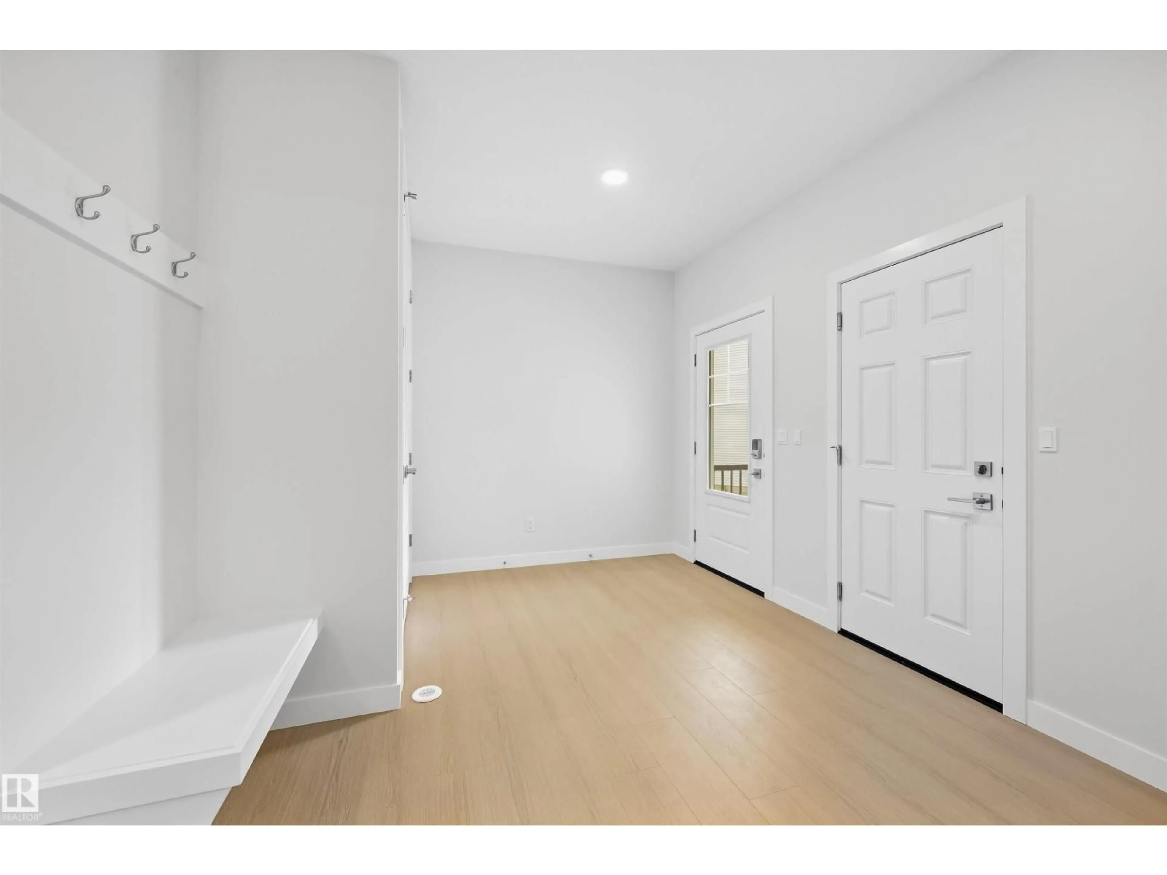 Indoor entryway for 19004 20 AV, Edmonton Alberta T6M3E8