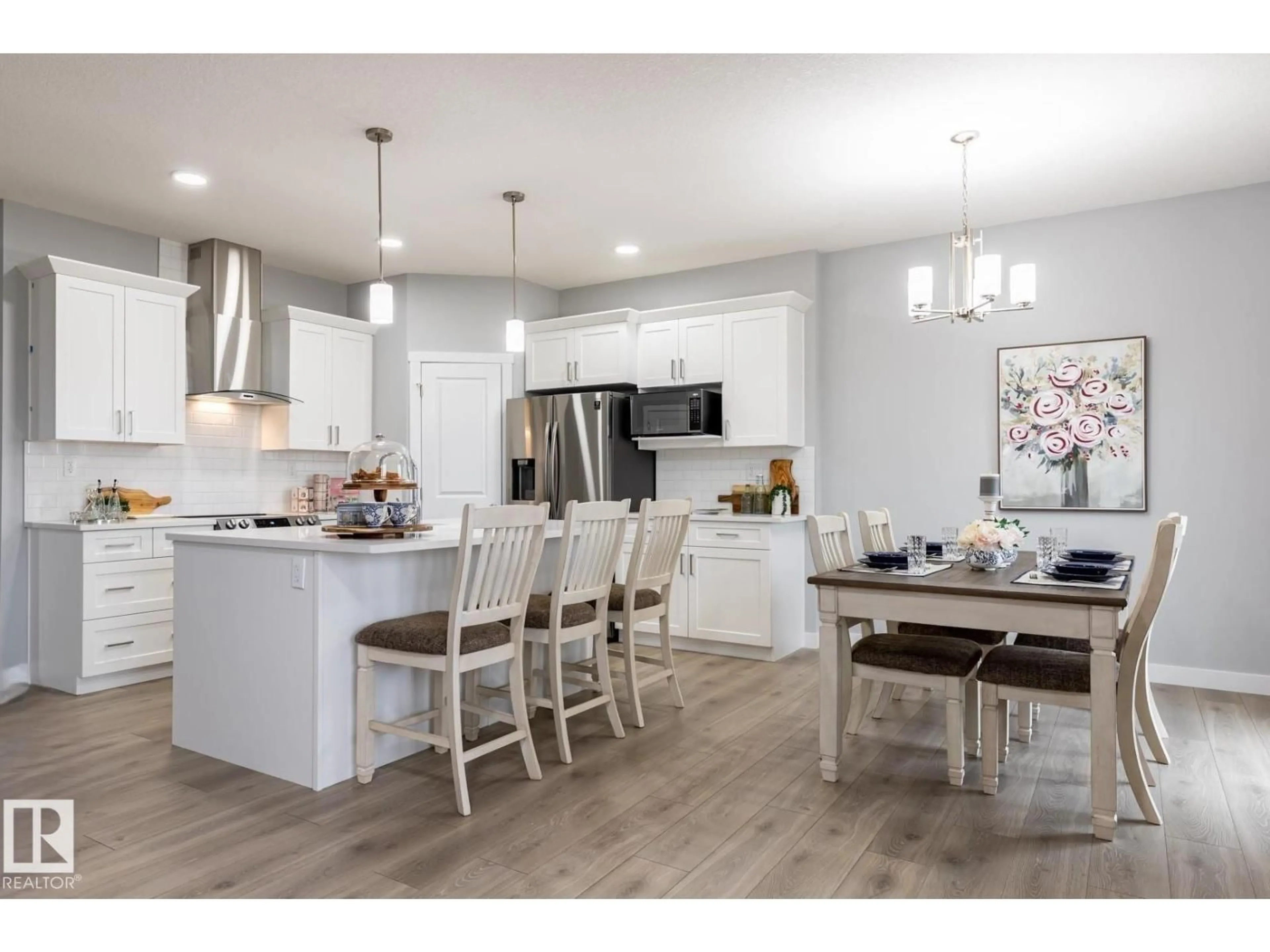 Open concept kitchen, wood/laminate floor for 17820 70 ST, Edmonton Alberta T5Z0T3