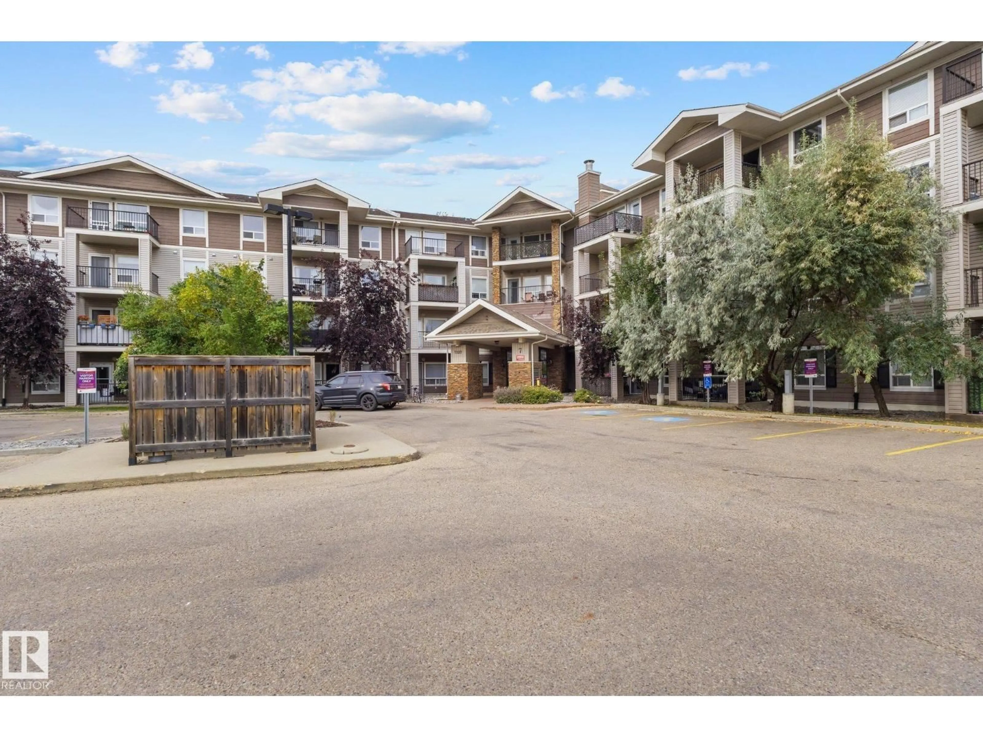 A pic from outside/outdoor area/front of a property/back of a property/a pic from drone, mountain view for 7327 - 7210 SOUTH TERWILLEGAR DR, Edmonton Alberta T6R0L8