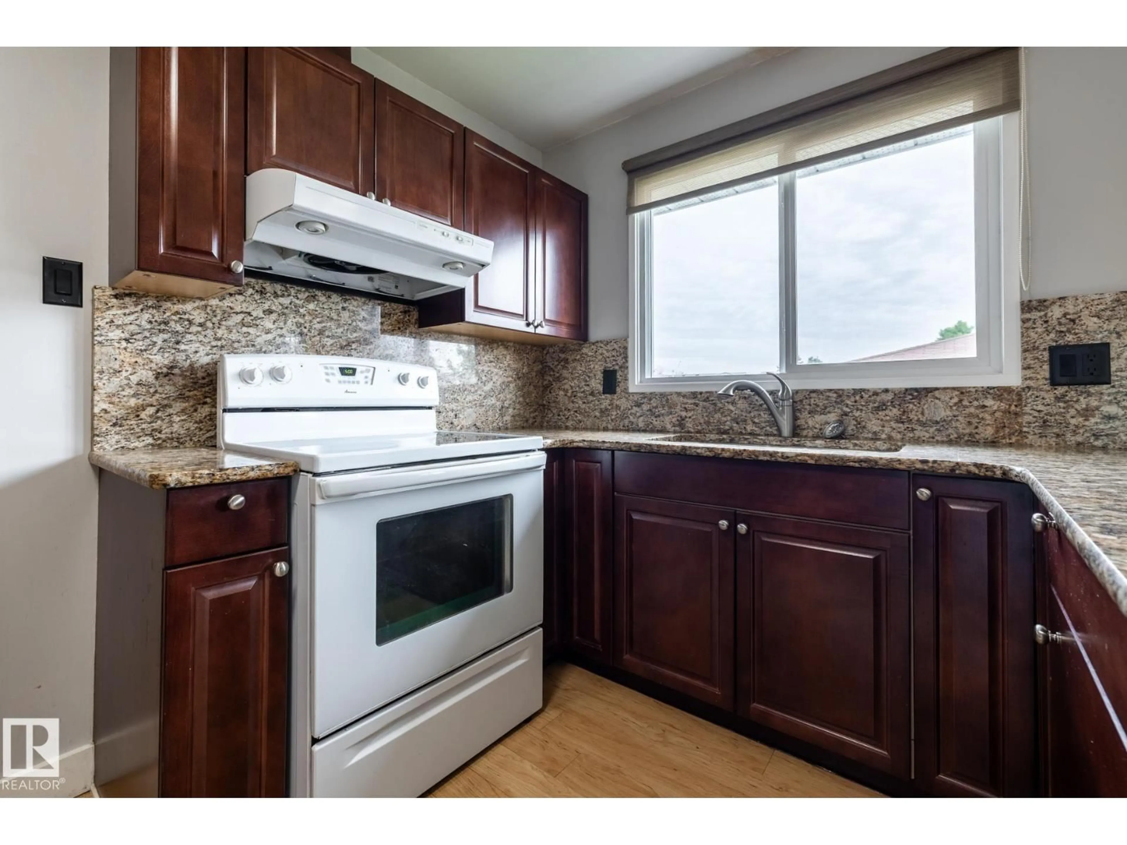 Standard kitchen, wood/laminate floor for NW - 8836 150 AV, Edmonton Alberta T5E2N5