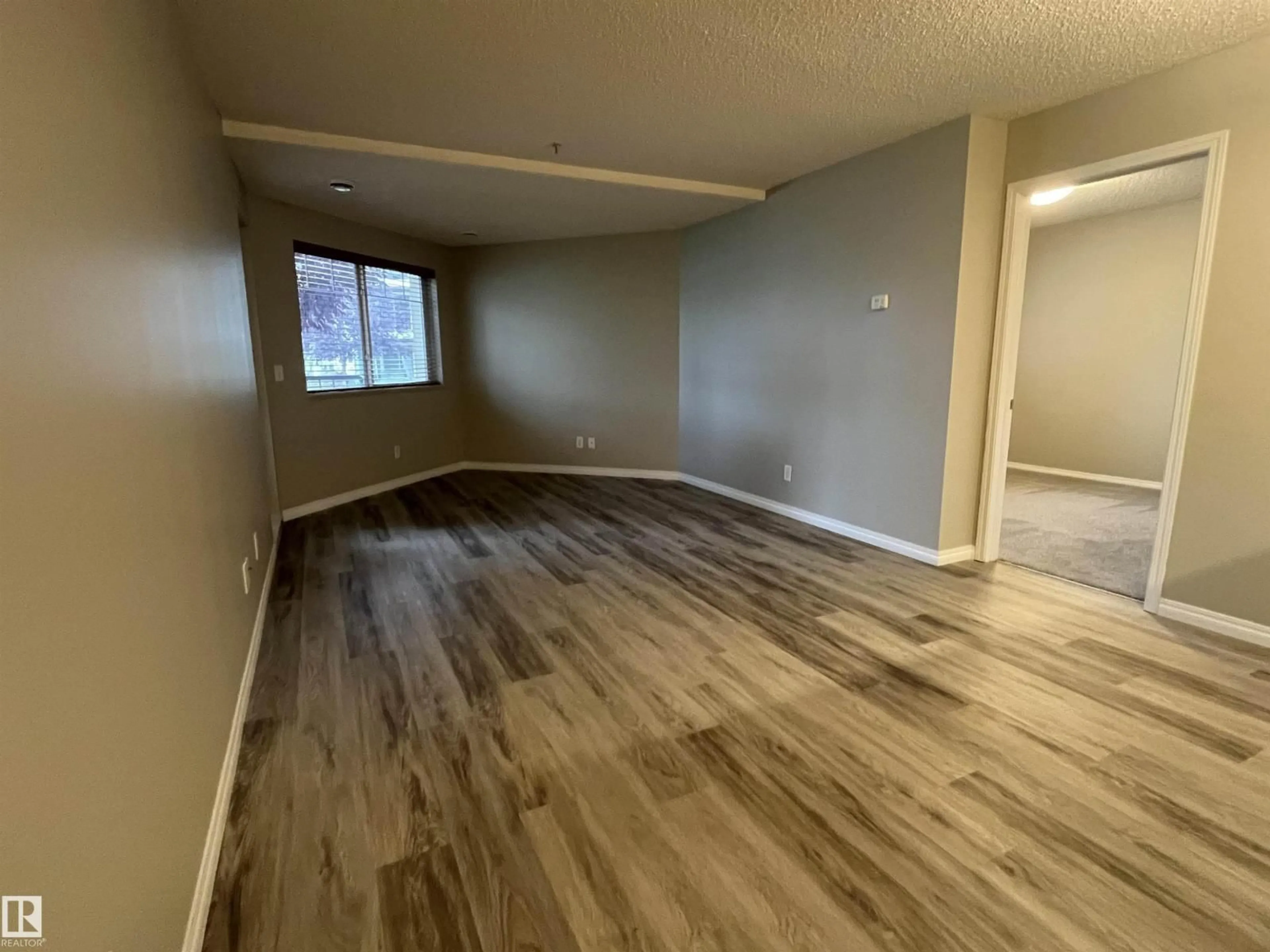A pic of a room for #102 - 6921 199 ST, Edmonton Alberta T5T3X7