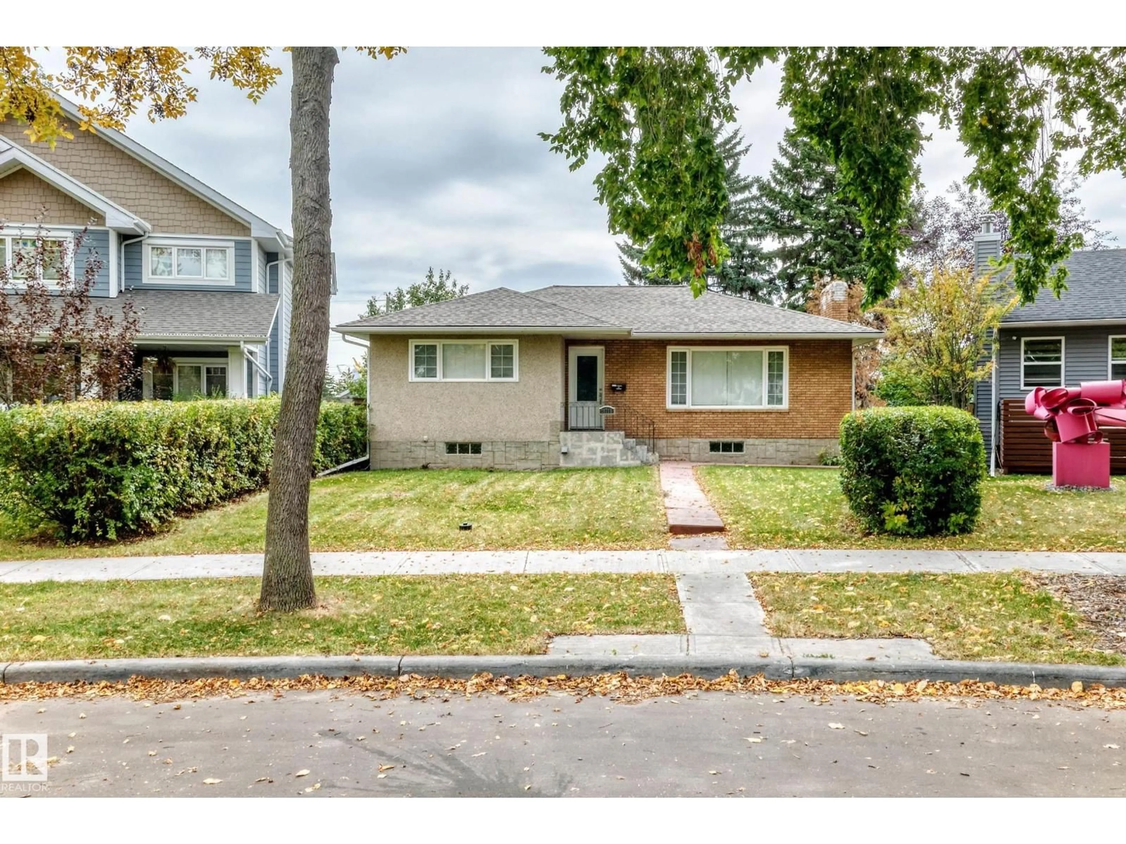 Home with brick exterior material, street for NW - 10715 133 ST, Edmonton Alberta T5M1G7
