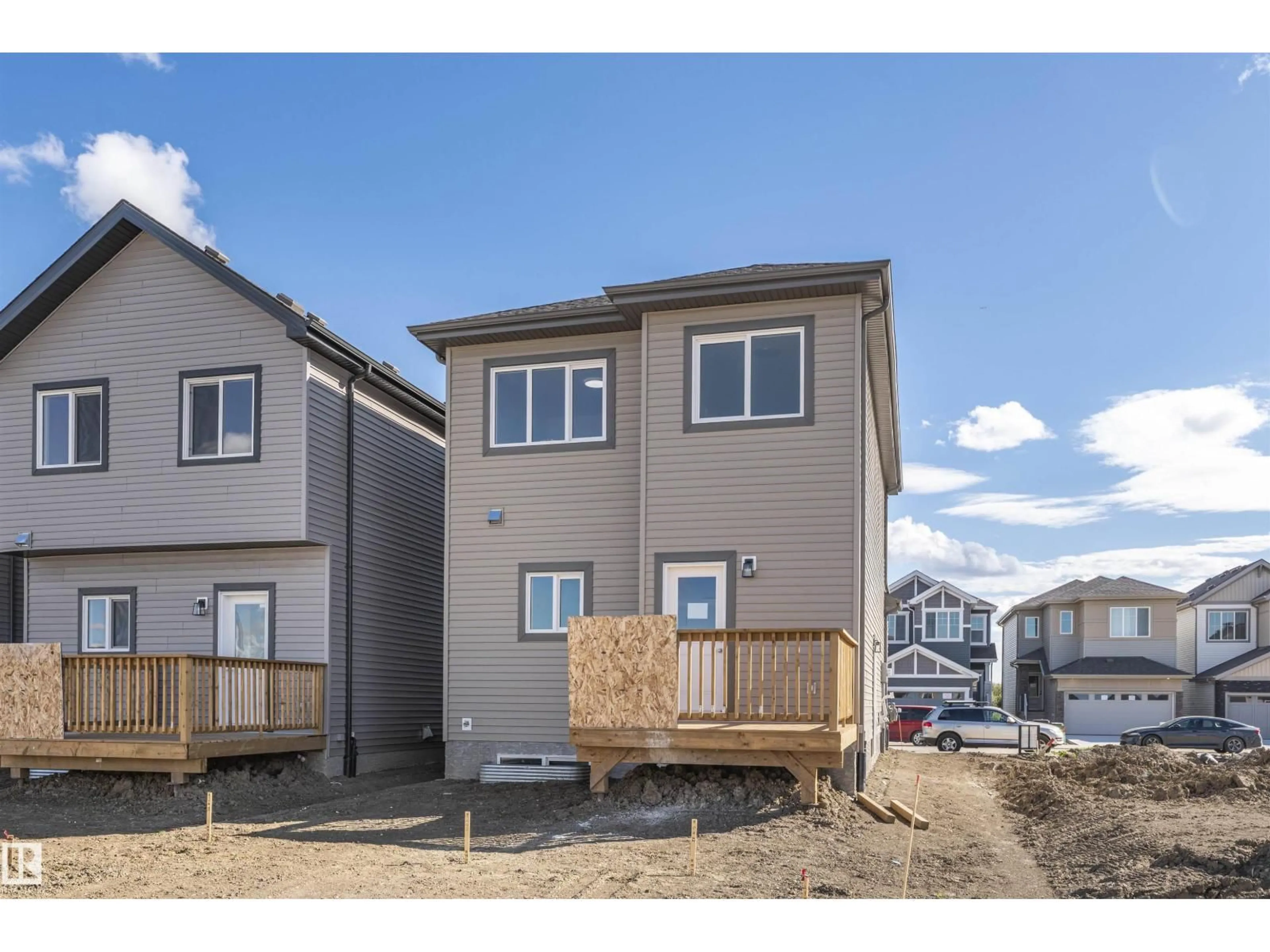 Home with vinyl exterior material, street for 20830 15A AV, Edmonton Alberta T6M3N8