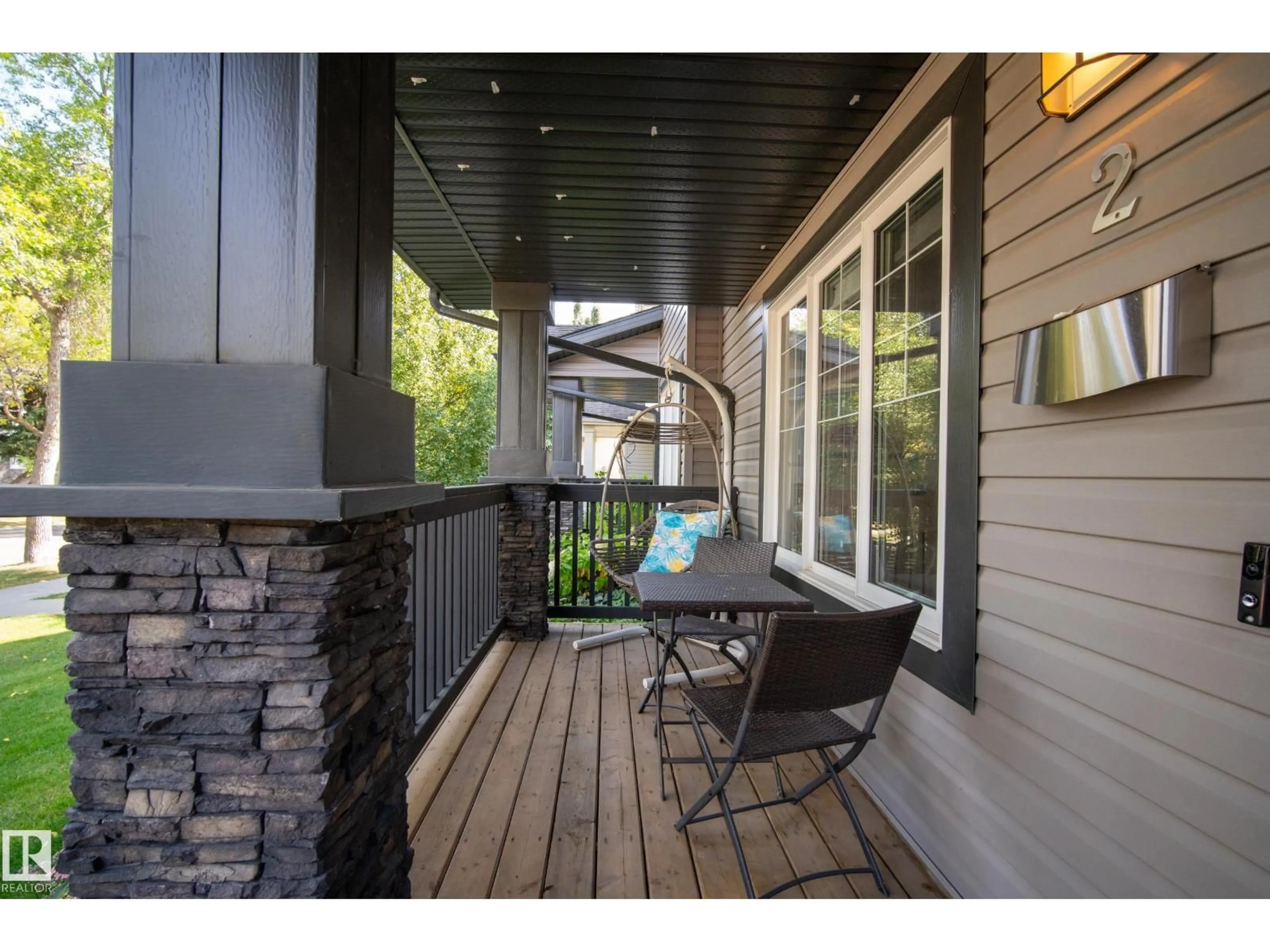 Patio, street for #2 - 8721 79 AV, Edmonton Alberta T6C0R5