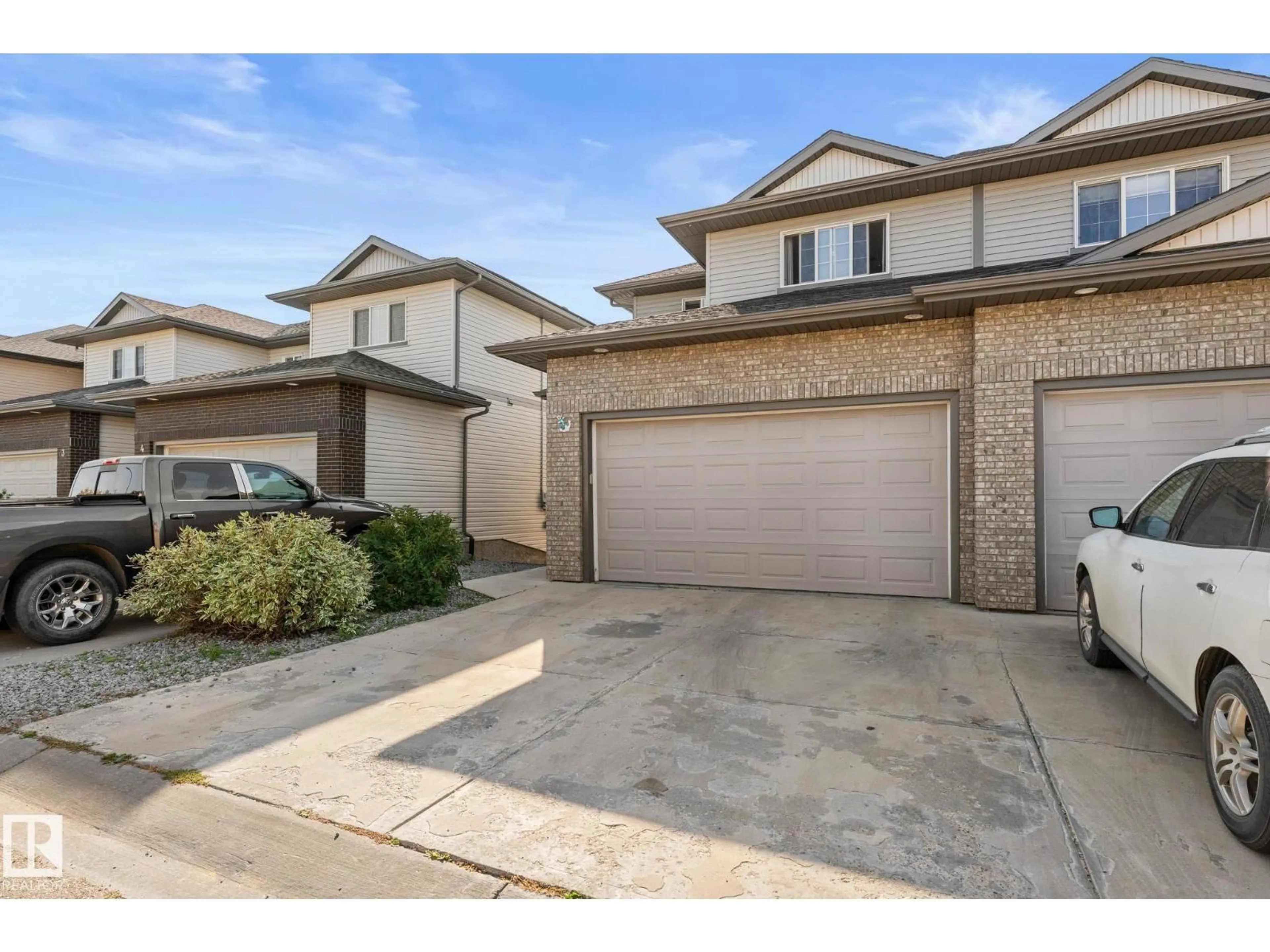 A pic from outside/outdoor area/front of a property/back of a property/a pic from drone, street for #5 - 4900 62 ST, Beaumont Alberta T4X0C6