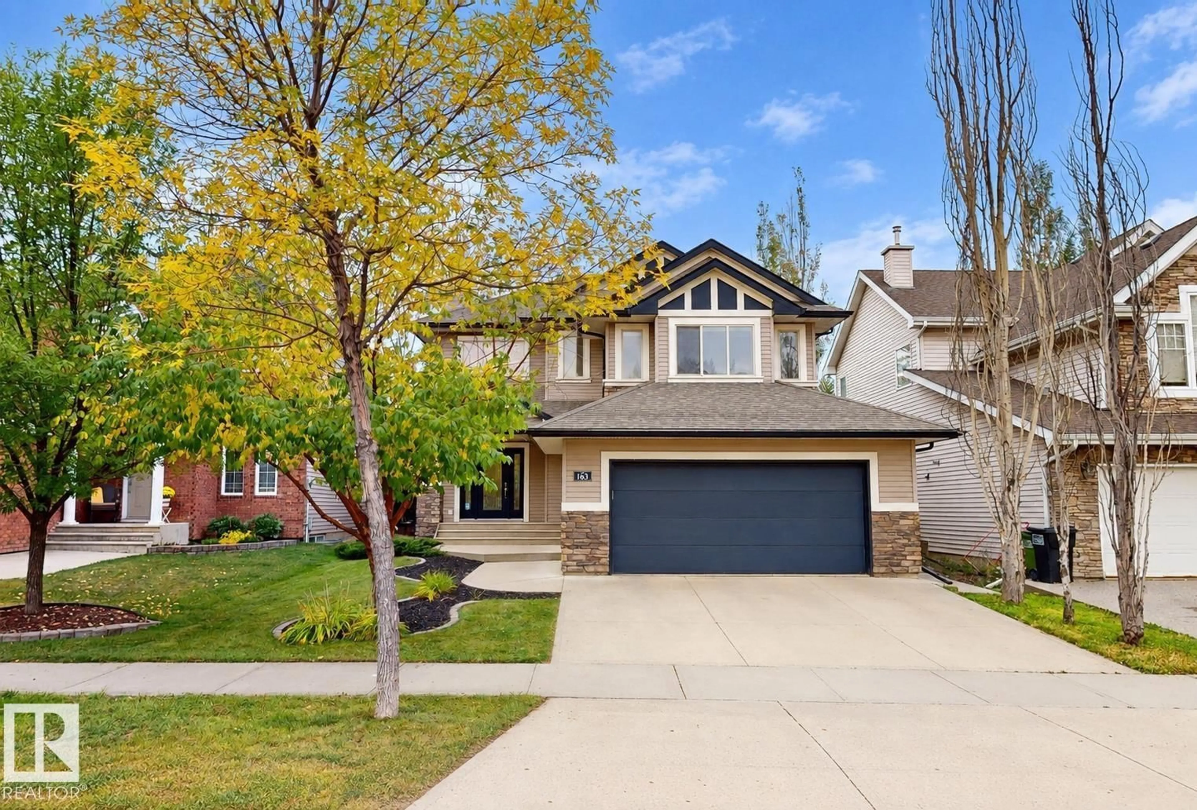 Home with vinyl exterior material, street for 163 CALDWELL WY, Edmonton Alberta T6M2X1
