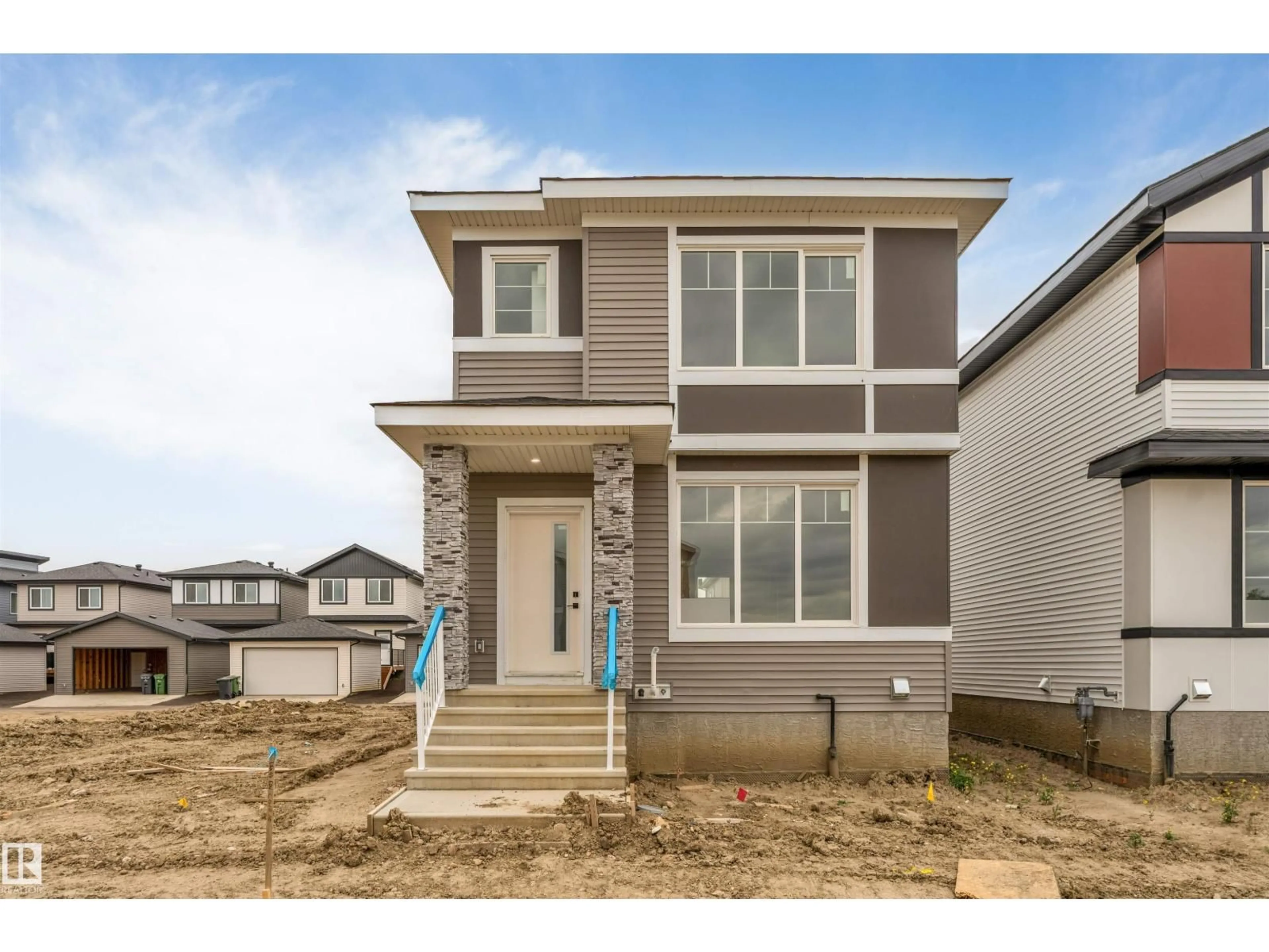 Home with vinyl exterior material, street for 523 ROBBINSON BLVD, Leduc Alberta T9E1Z3