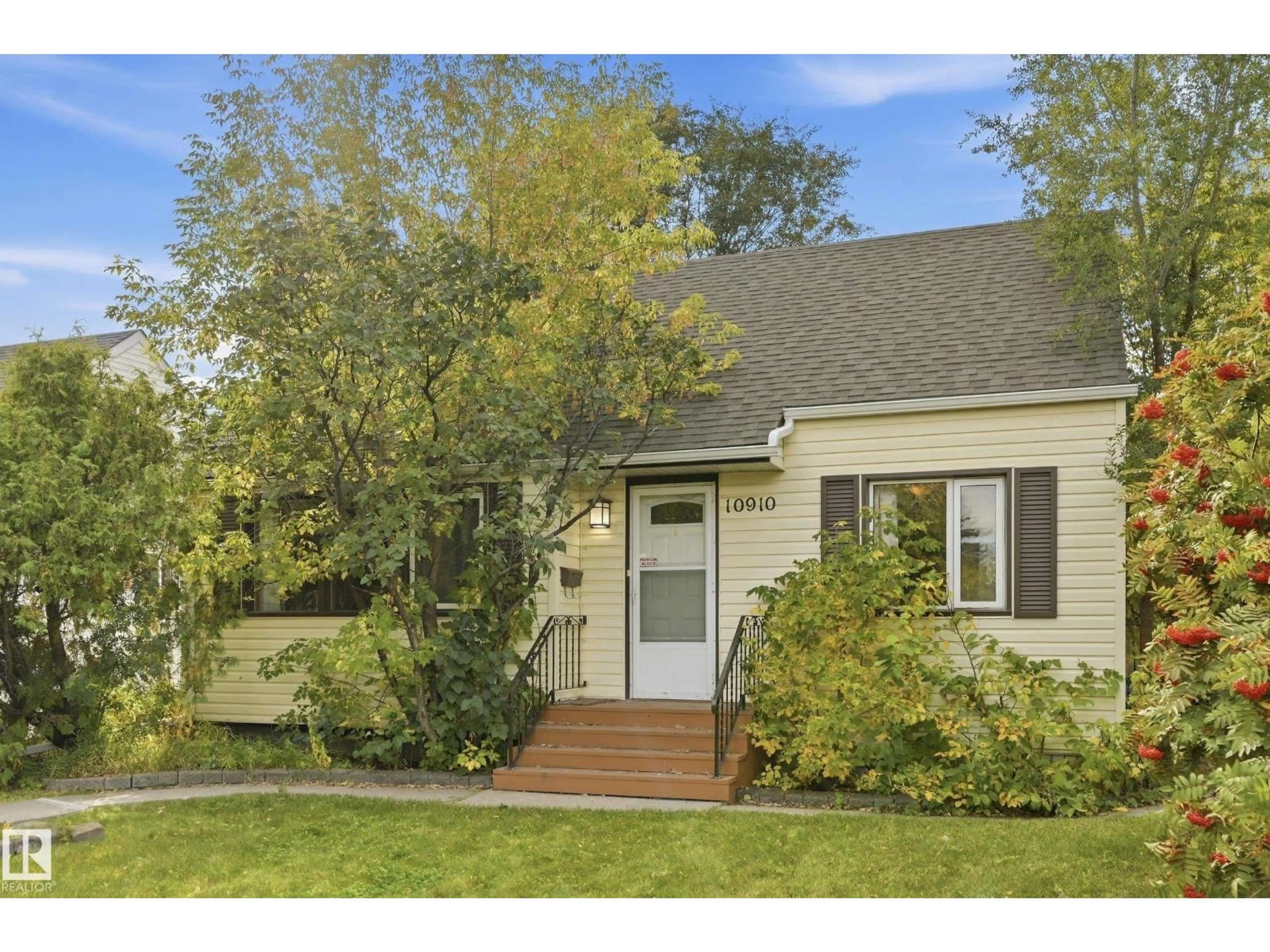 Home with vinyl exterior material, street for NW - 10910 117 ST, Edmonton Alberta T5H3N6
