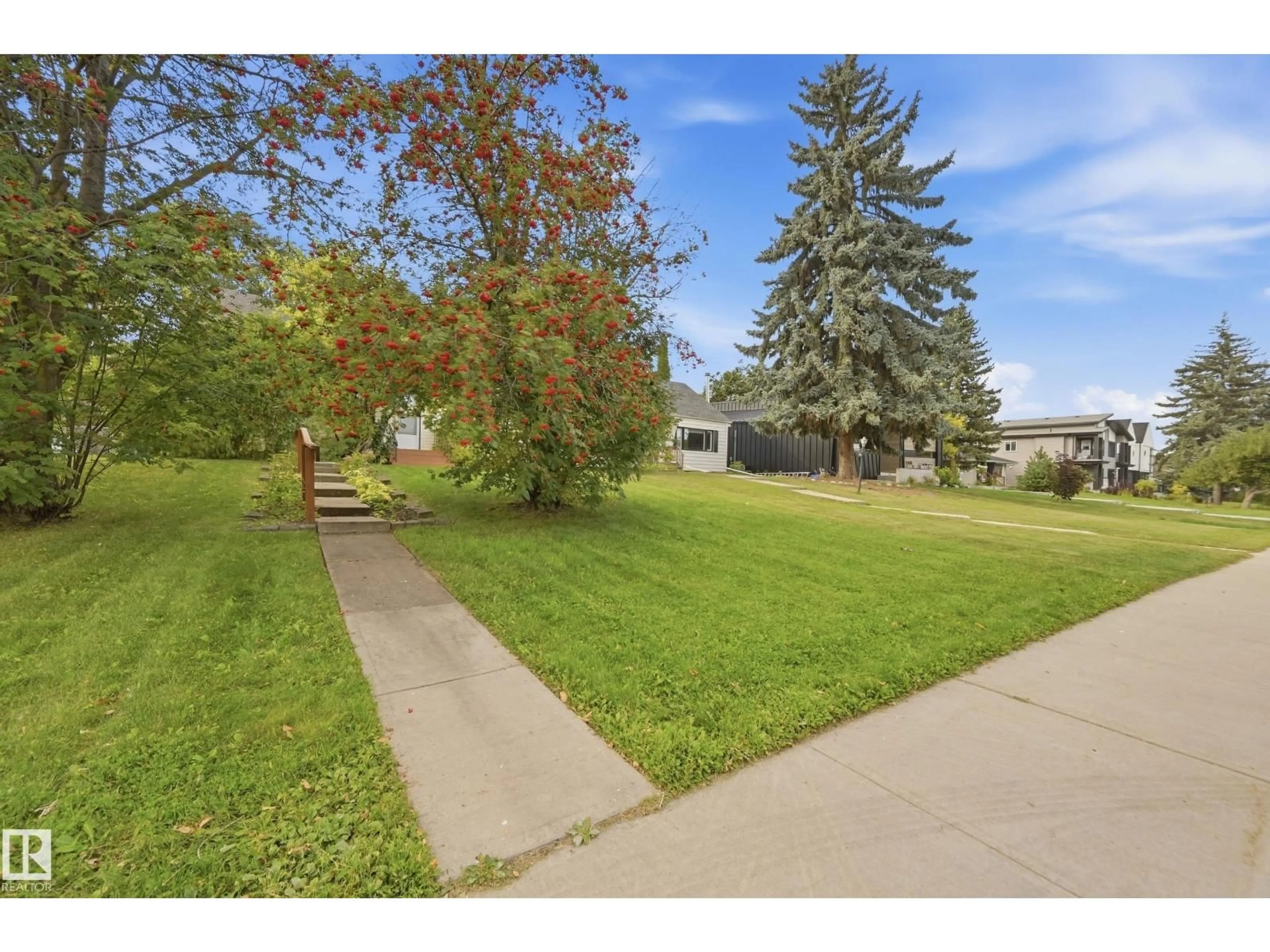 A pic from outside/outdoor area/front of a property/back of a property/a pic from drone, street for NW - 10910 117 ST, Edmonton Alberta T5H3N6