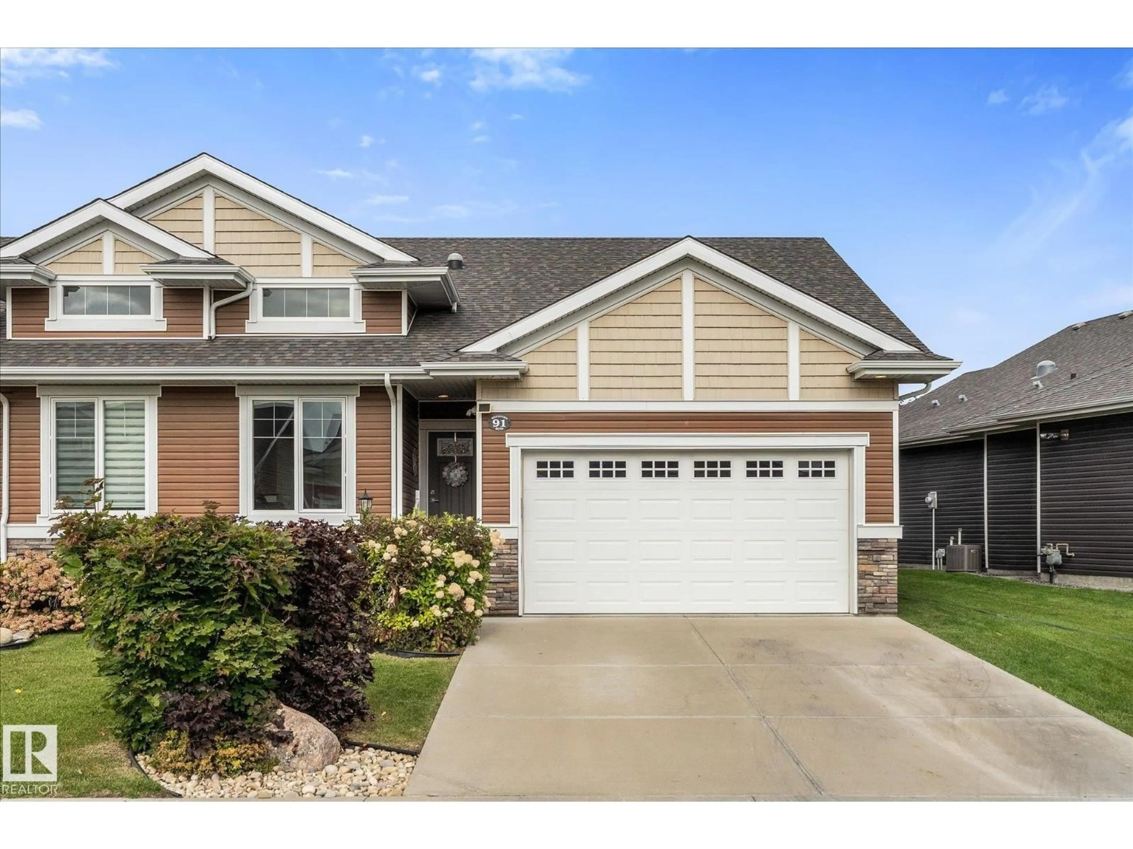 Home with vinyl exterior material, street for 91 BRICKYARD BN, Stony Plain Alberta T7Z0H9