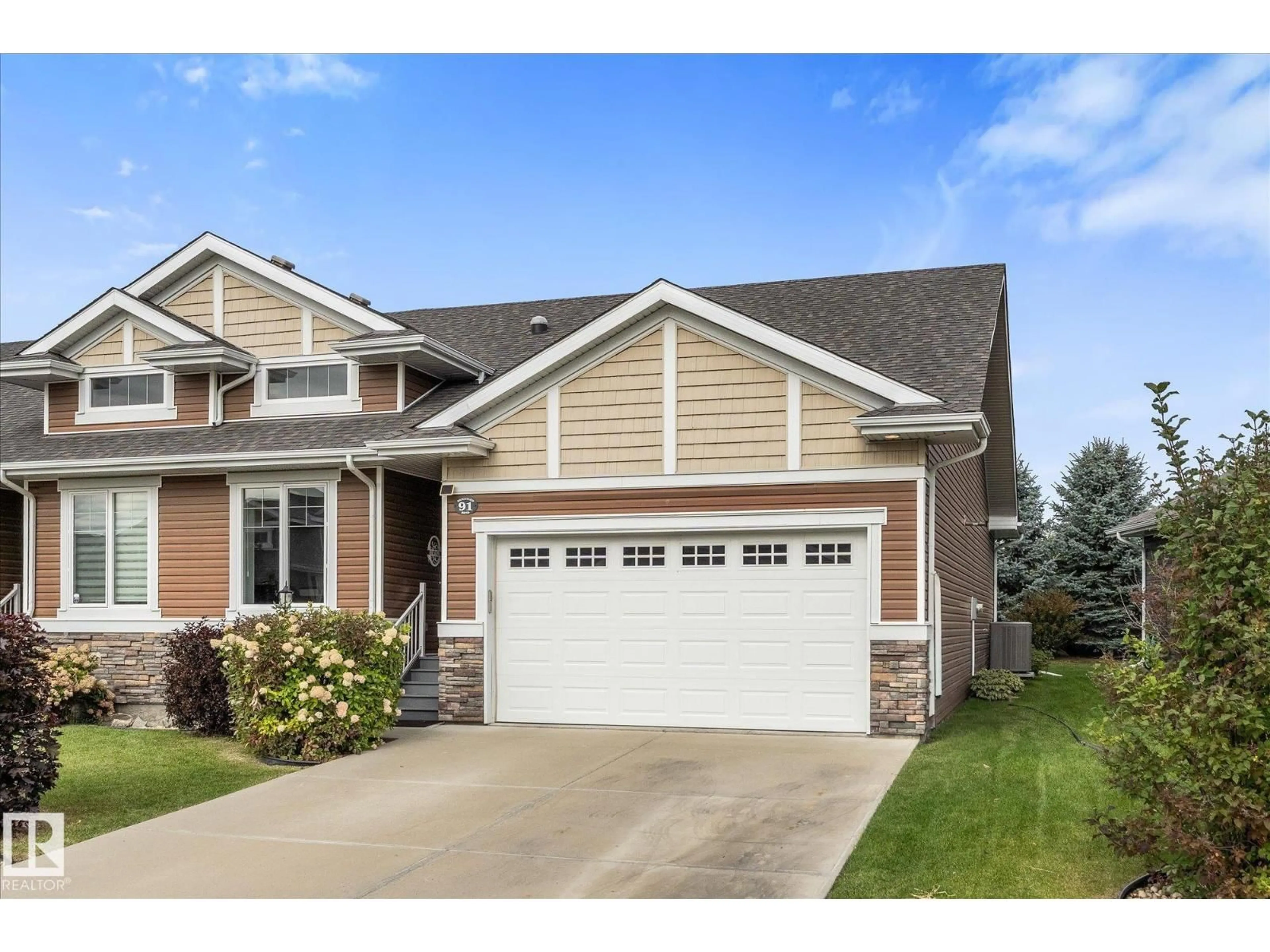 Home with vinyl exterior material, street for 91 BRICKYARD BN, Stony Plain Alberta T7Z0H9