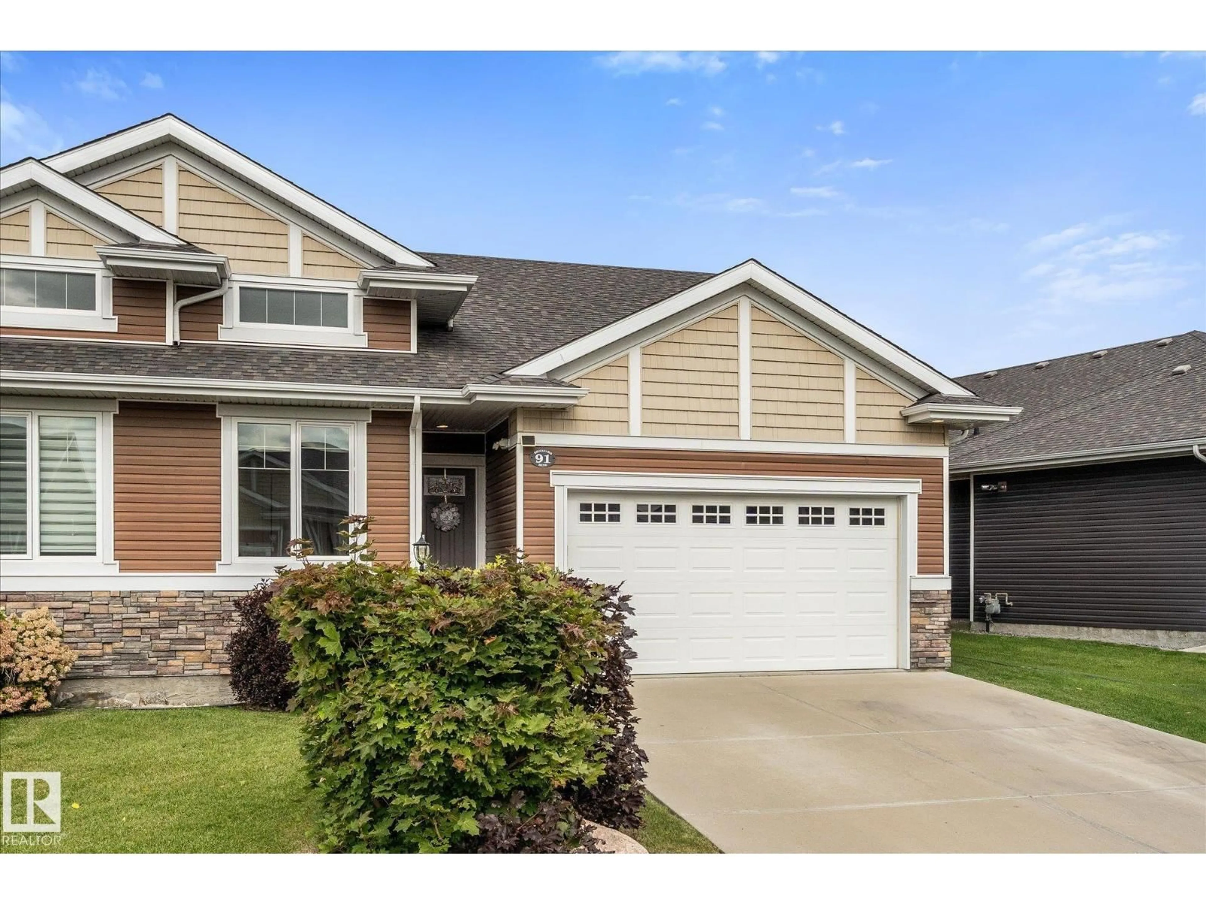 Home with vinyl exterior material, street for 91 BRICKYARD BN, Stony Plain Alberta T7Z0H9