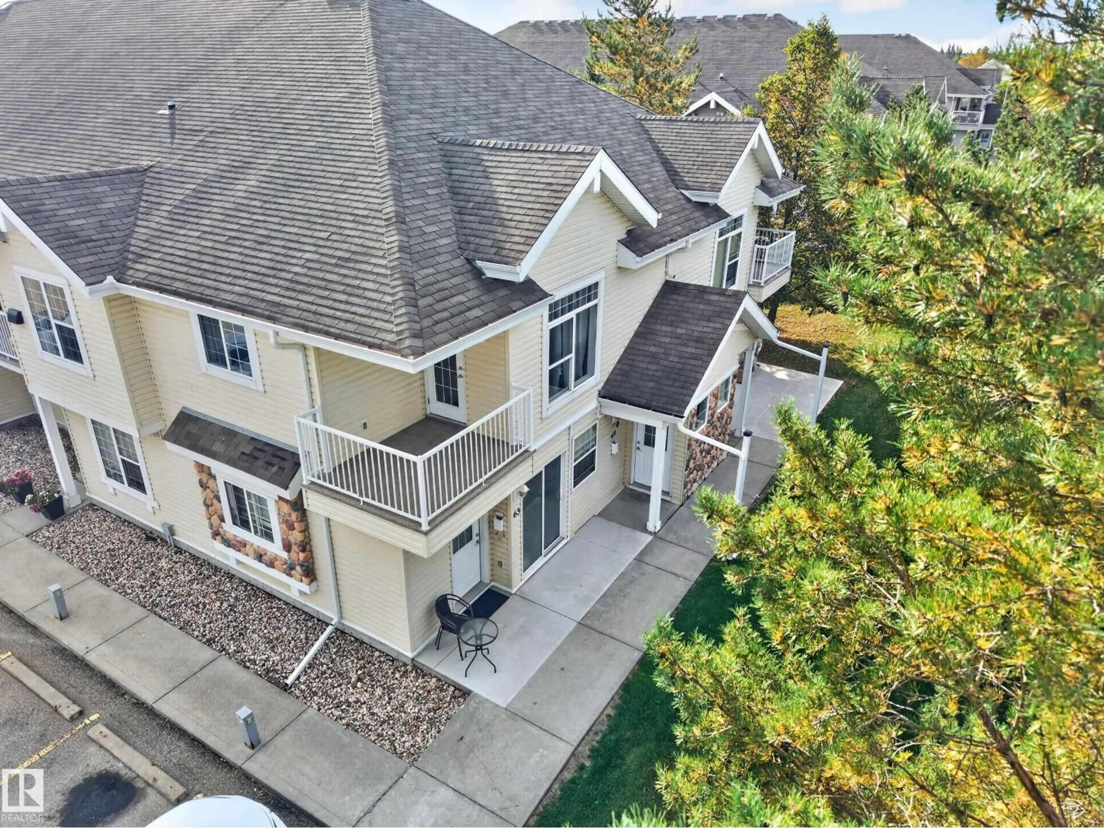 A pic from outside/outdoor area/front of a property/back of a property/a pic from drone, street for 150 - 69 EDWARDS DR, Edmonton Alberta T6X1M4