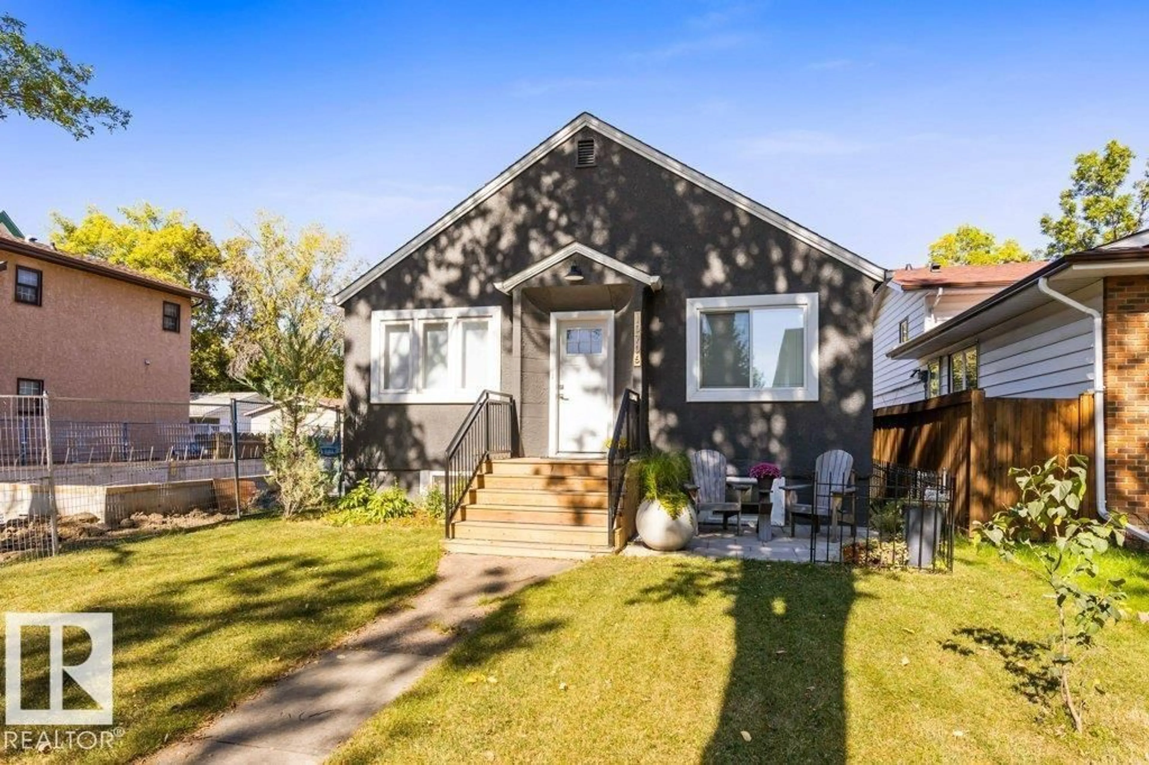 Home with vinyl exterior material, street for 10706 75 AV, Edmonton Alberta T6E1J9