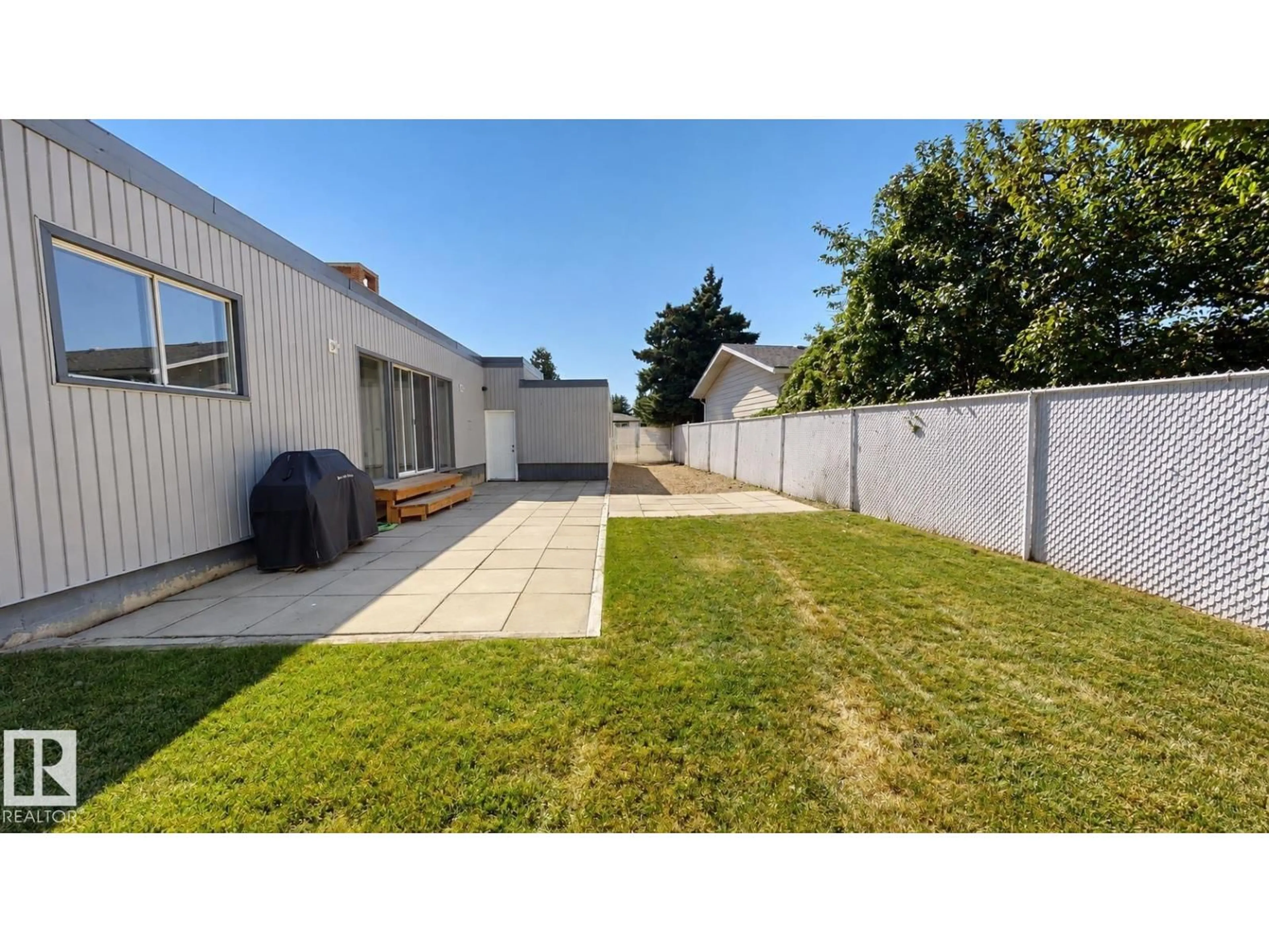 A pic from outside/outdoor area/front of a property/back of a property/a pic from drone, street for 8204 14 AV, Edmonton Alberta T6K1X4