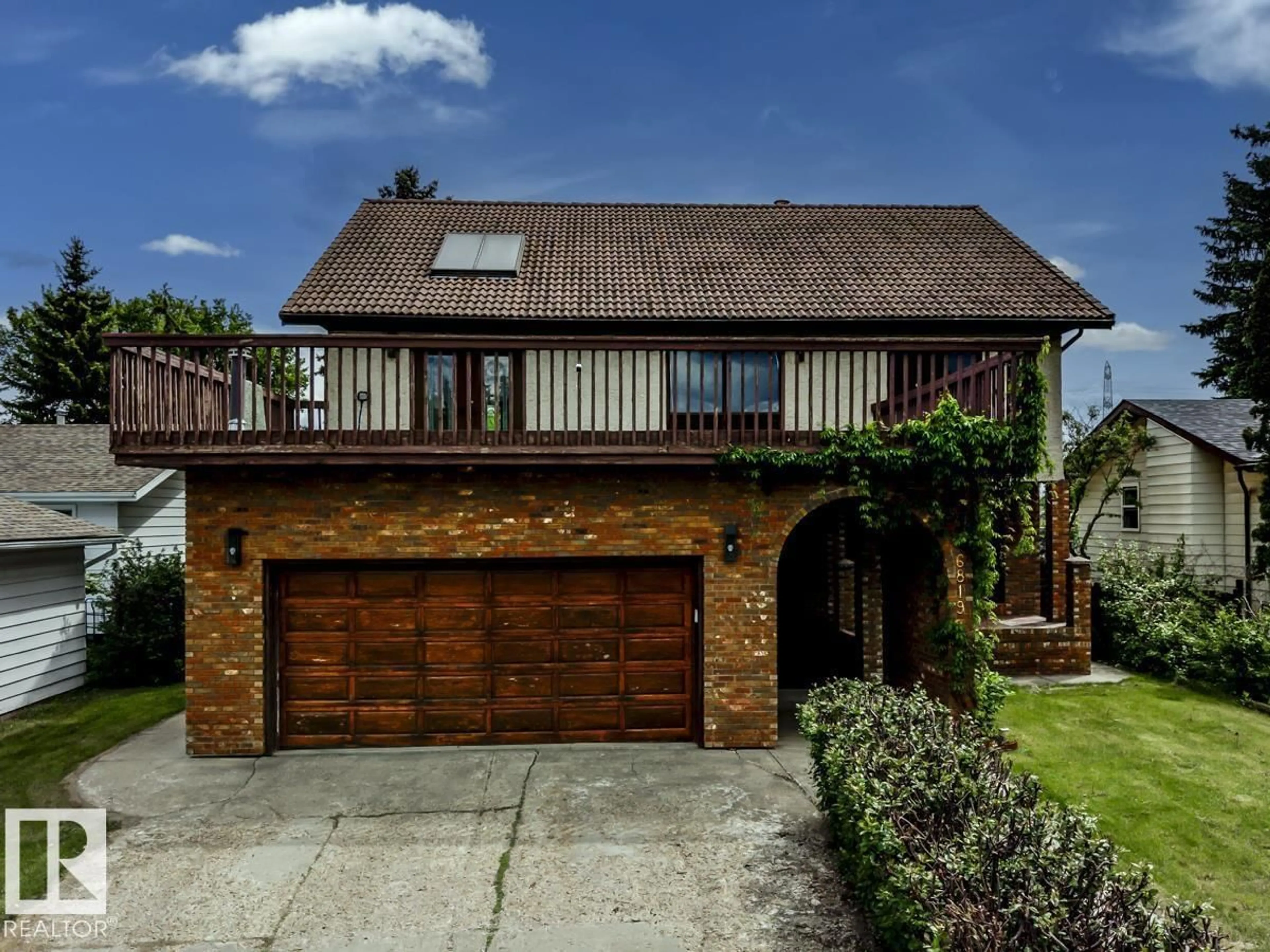 Home with brick exterior material, street for 6819 10 AV, Edmonton Alberta T6K2T9