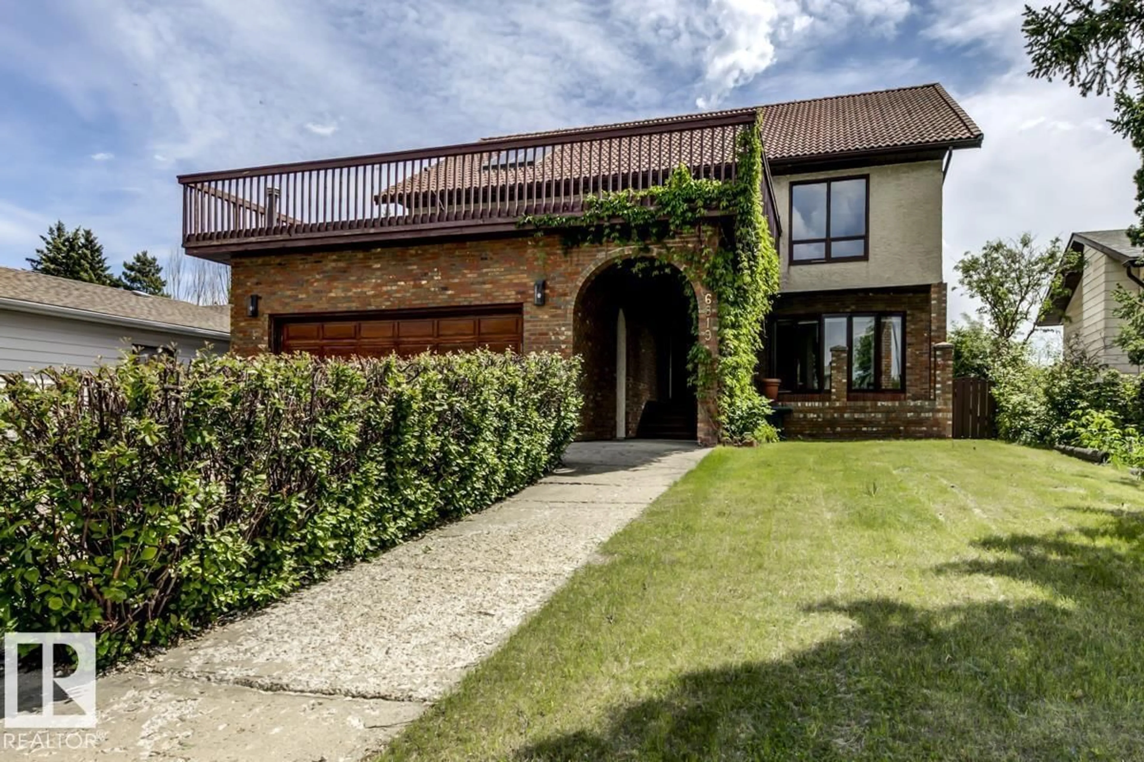 Home with brick exterior material, street for 6819 10 AV, Edmonton Alberta T6K2T9