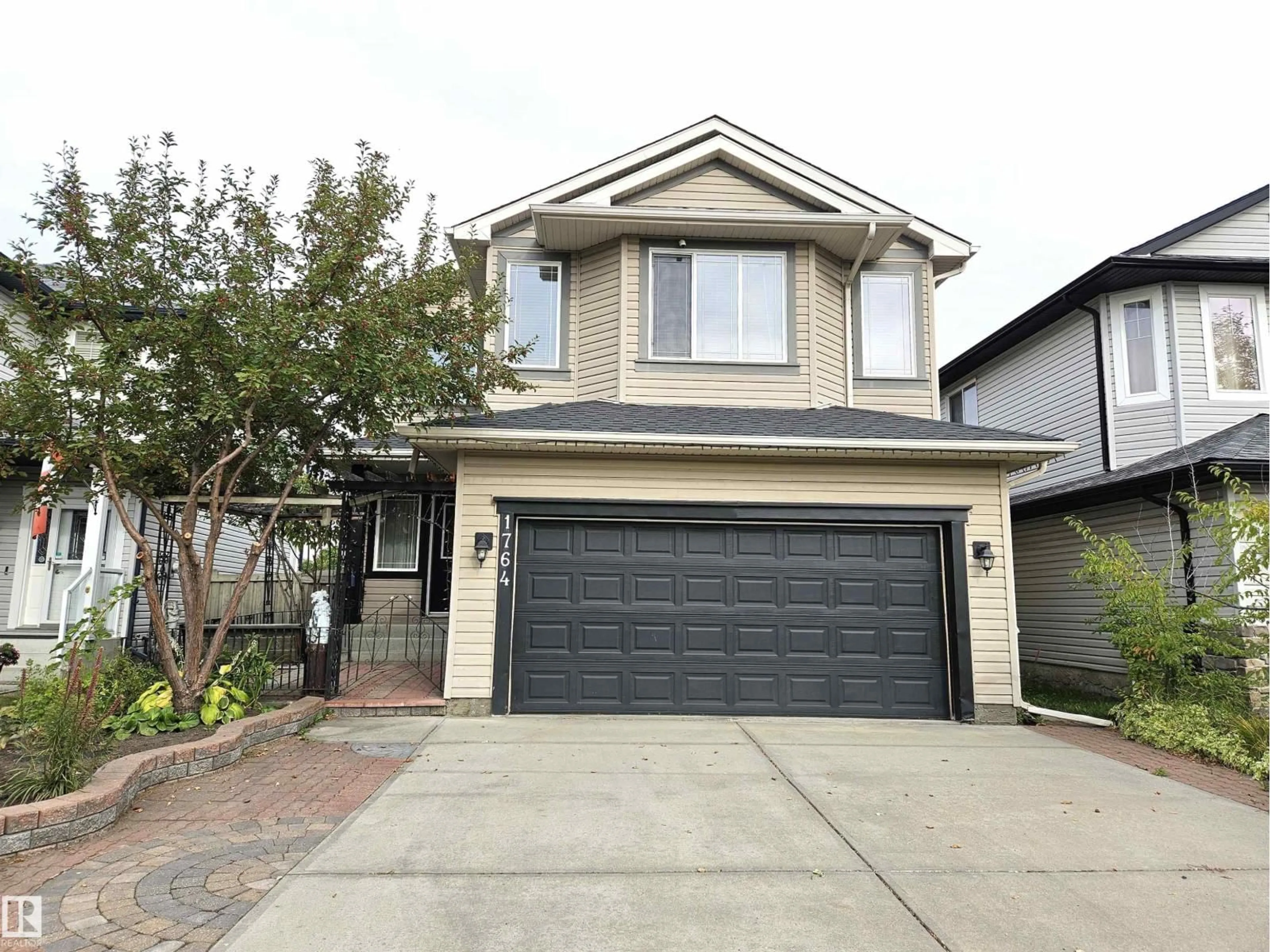 Home with vinyl exterior material, street for 1764 MELROSE CR, Edmonton Alberta T6W0A2