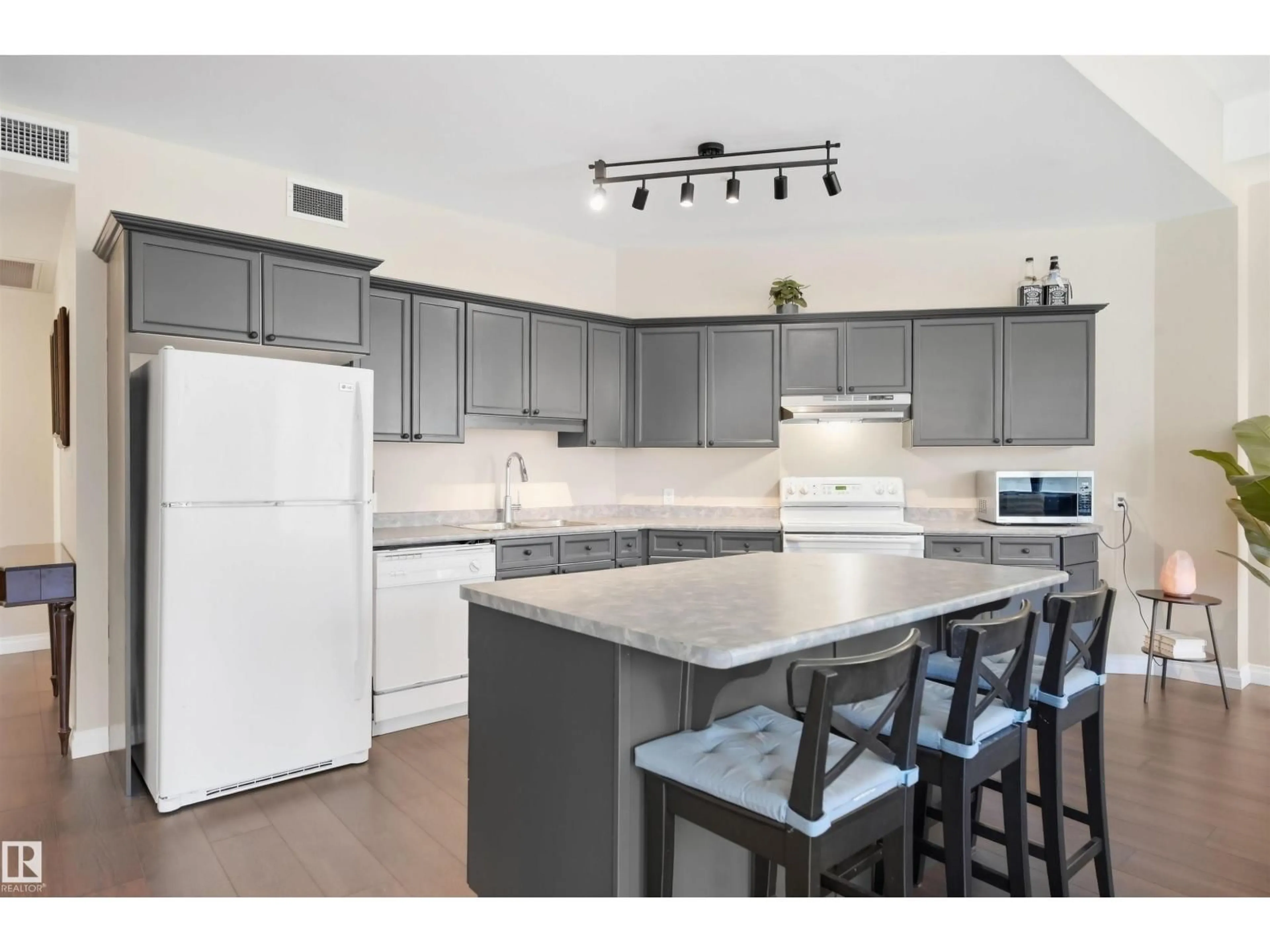 Open concept kitchen, unknown for #302 - 10106 105 ST NW, Edmonton Alberta T5J5E7