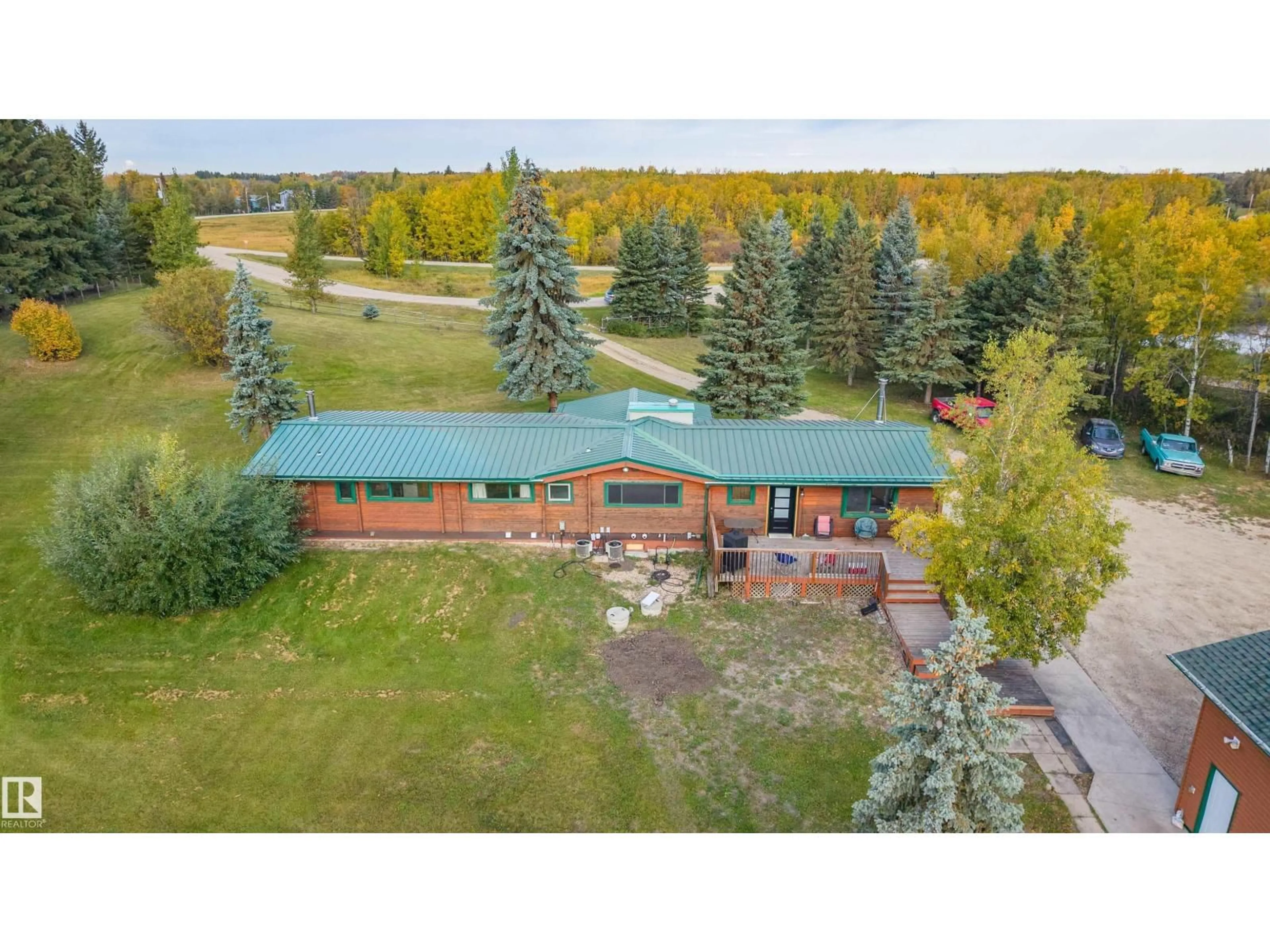 A pic from outside/outdoor area/front of a property/back of a property/a pic from drone, unknown for 97 - 52307 RGE ROAD 213, Rural Strathcona County Alberta T8G1C1