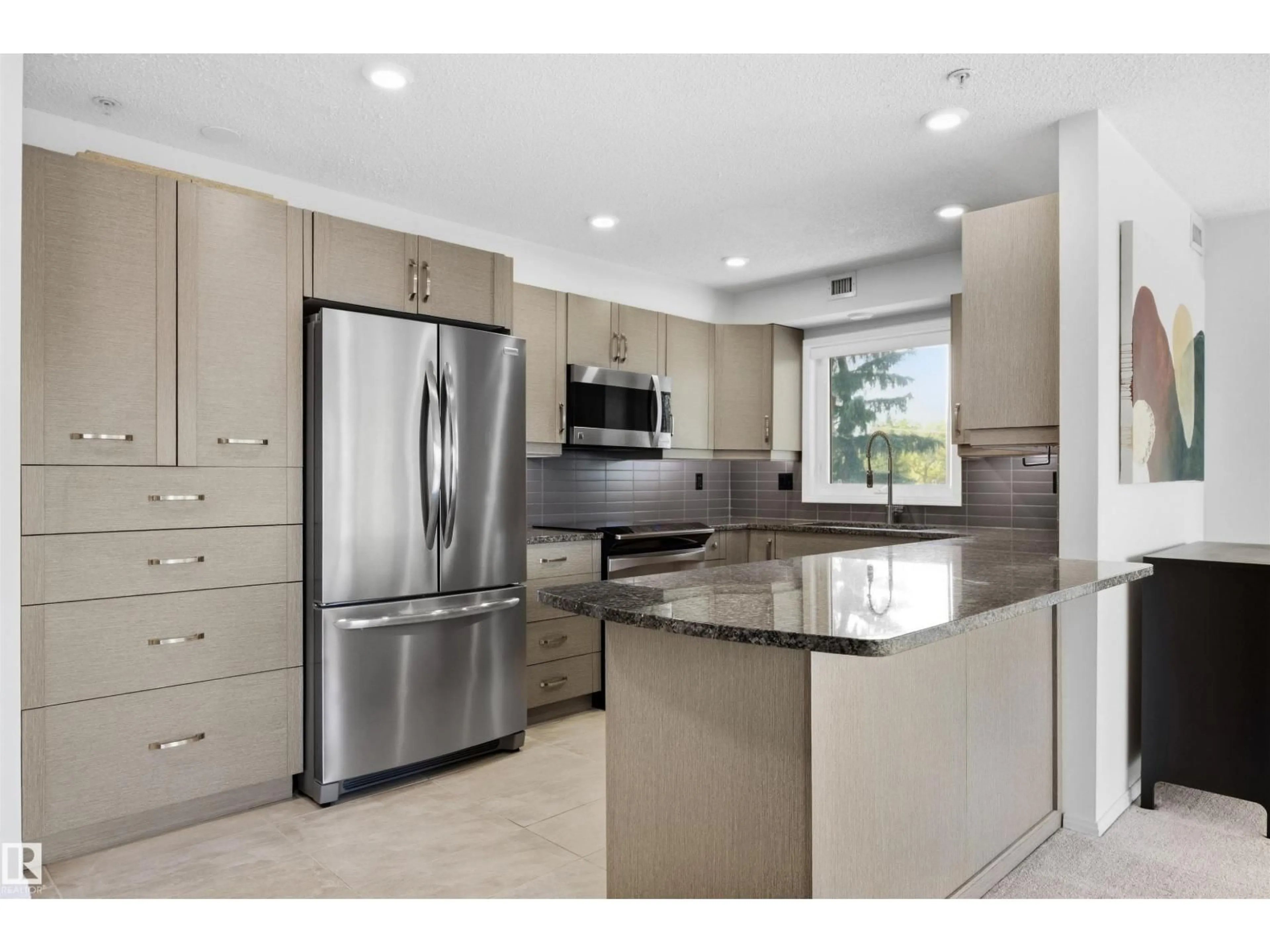 Open concept kitchen, ceramic/tile floor for 309 - 8909 100 ST, Edmonton Alberta T6E6T4