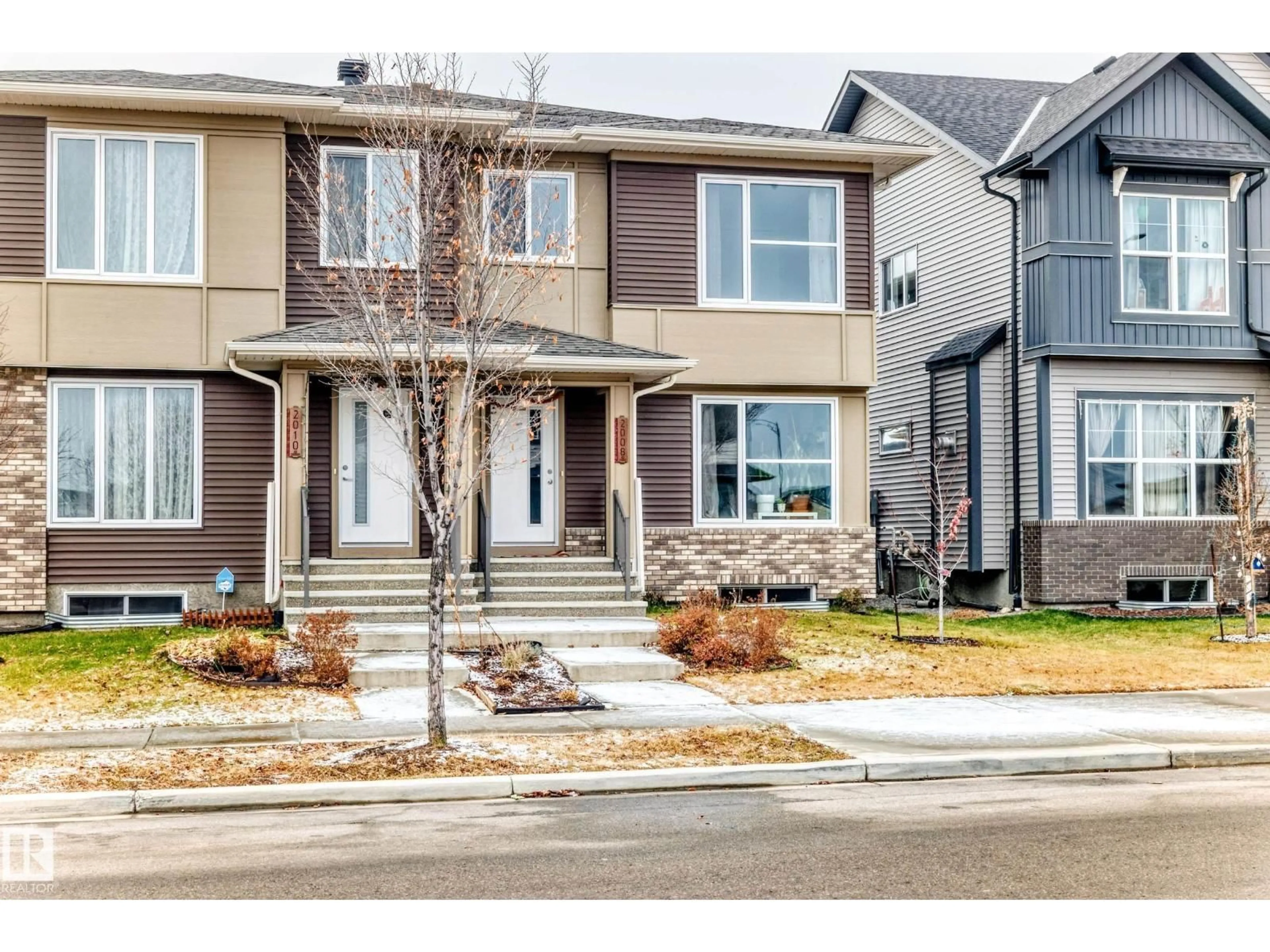 Home with vinyl exterior material, street for 2008 CAVANAGH DR, Edmonton Alberta T6W3M6