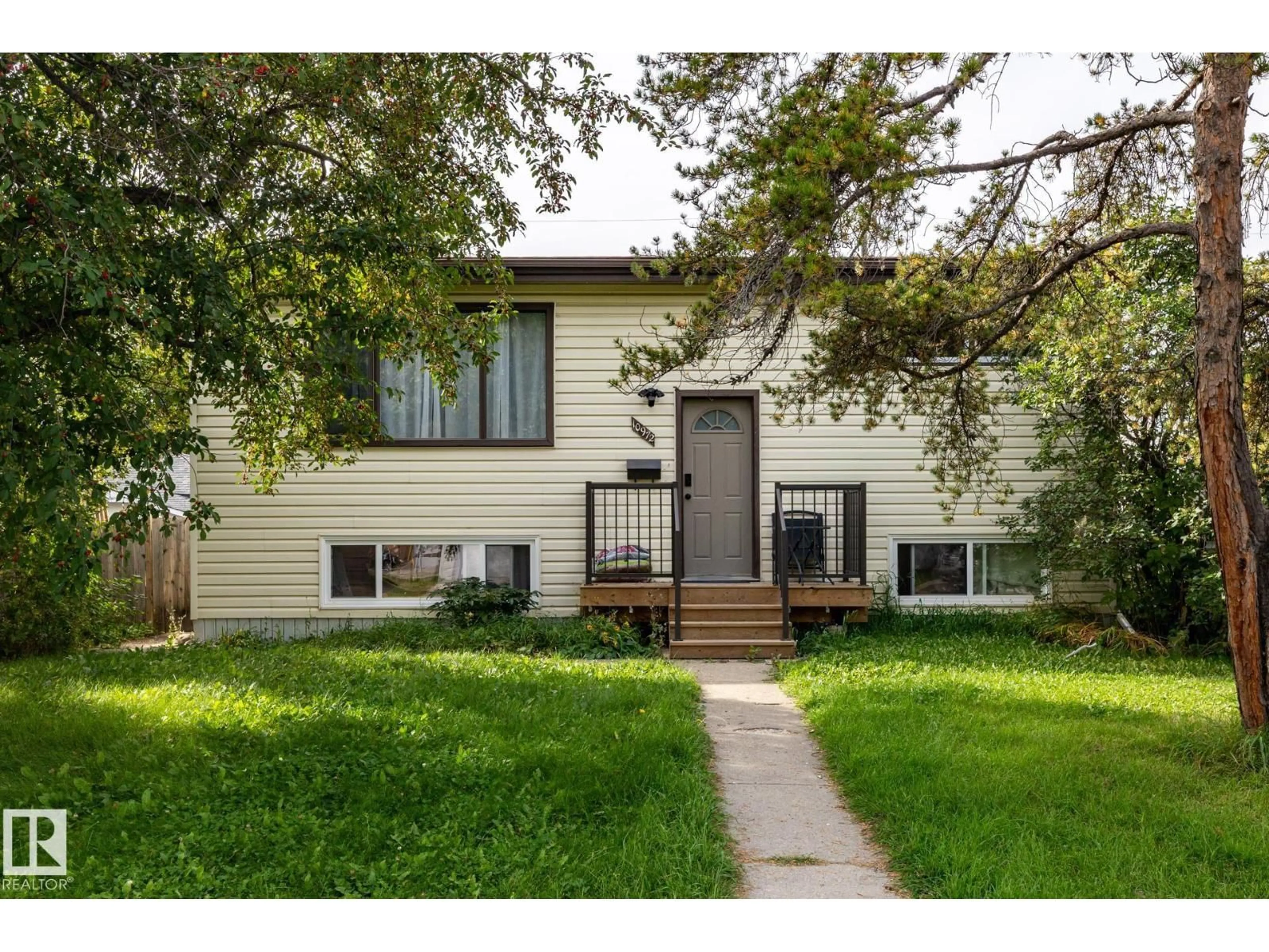 Home with vinyl exterior material, street for NW - 10972 157 ST, Edmonton Alberta T5P2W3