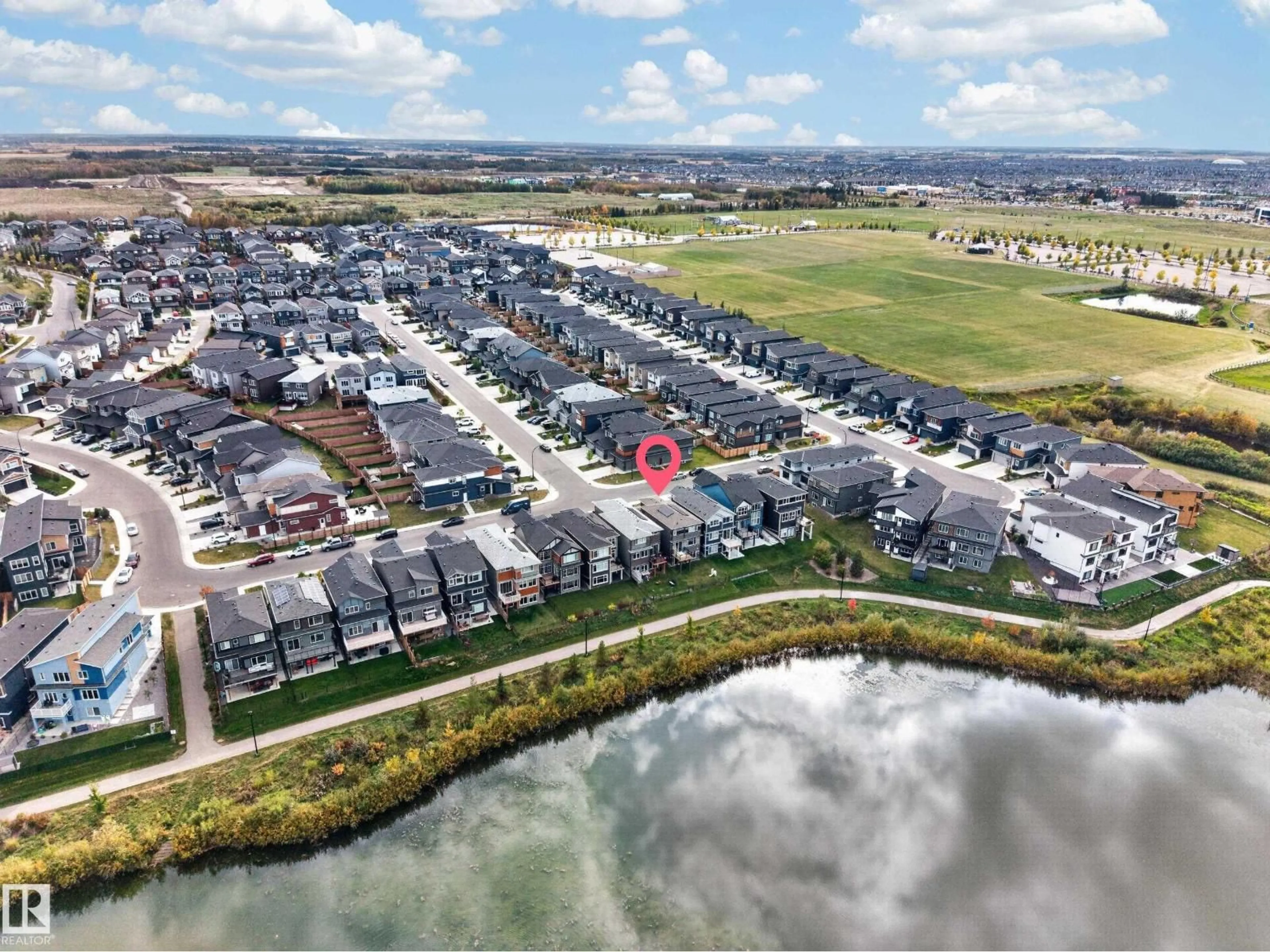 A pic from outside/outdoor area/front of a property/back of a property/a pic from drone, water/lake/river/ocean view for 4104 3 AV SW, Edmonton Alberta T6X3A2