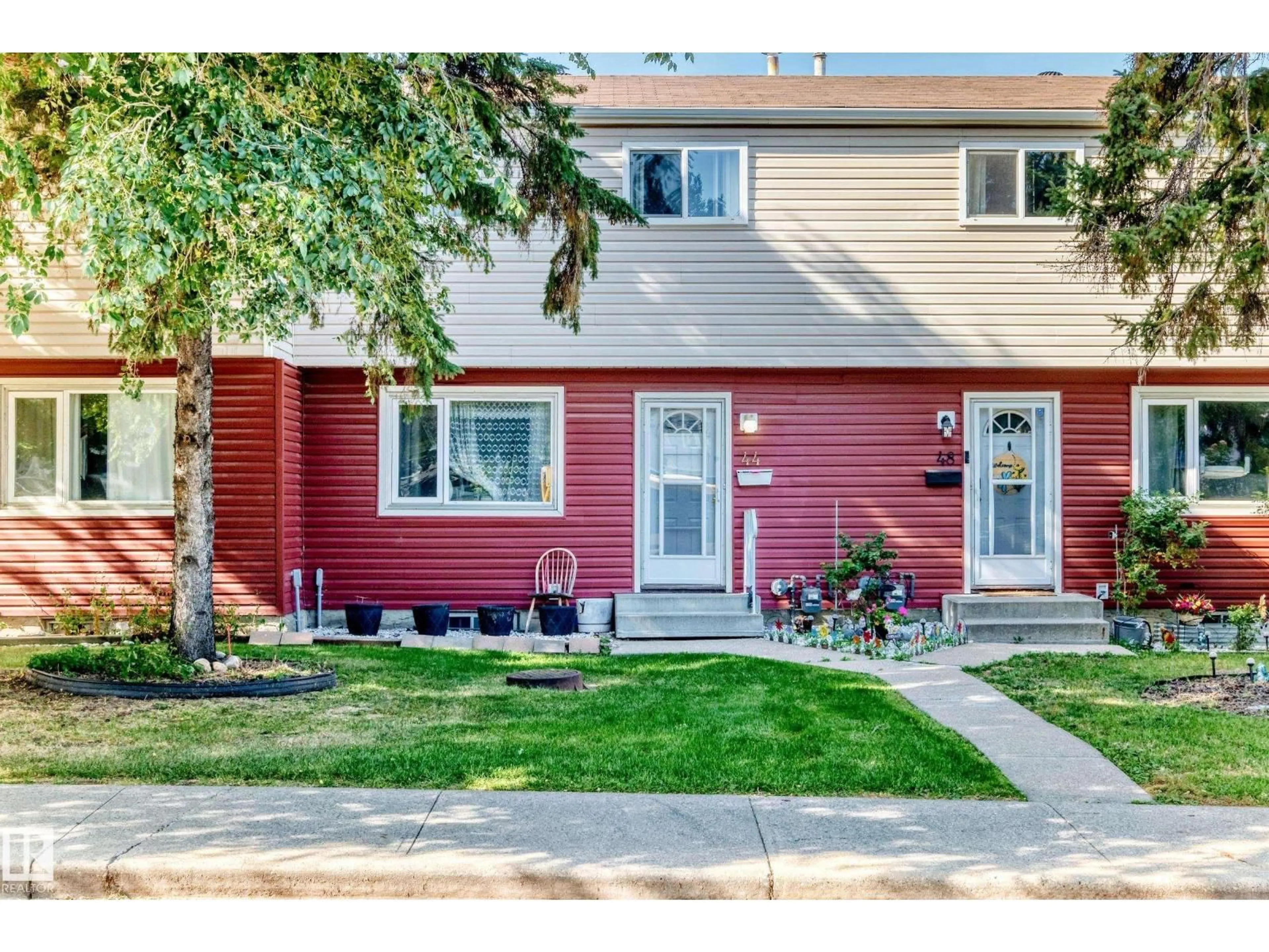 Home with vinyl exterior material, street for 44 HABITAT CR, Edmonton Alberta T5A2X7