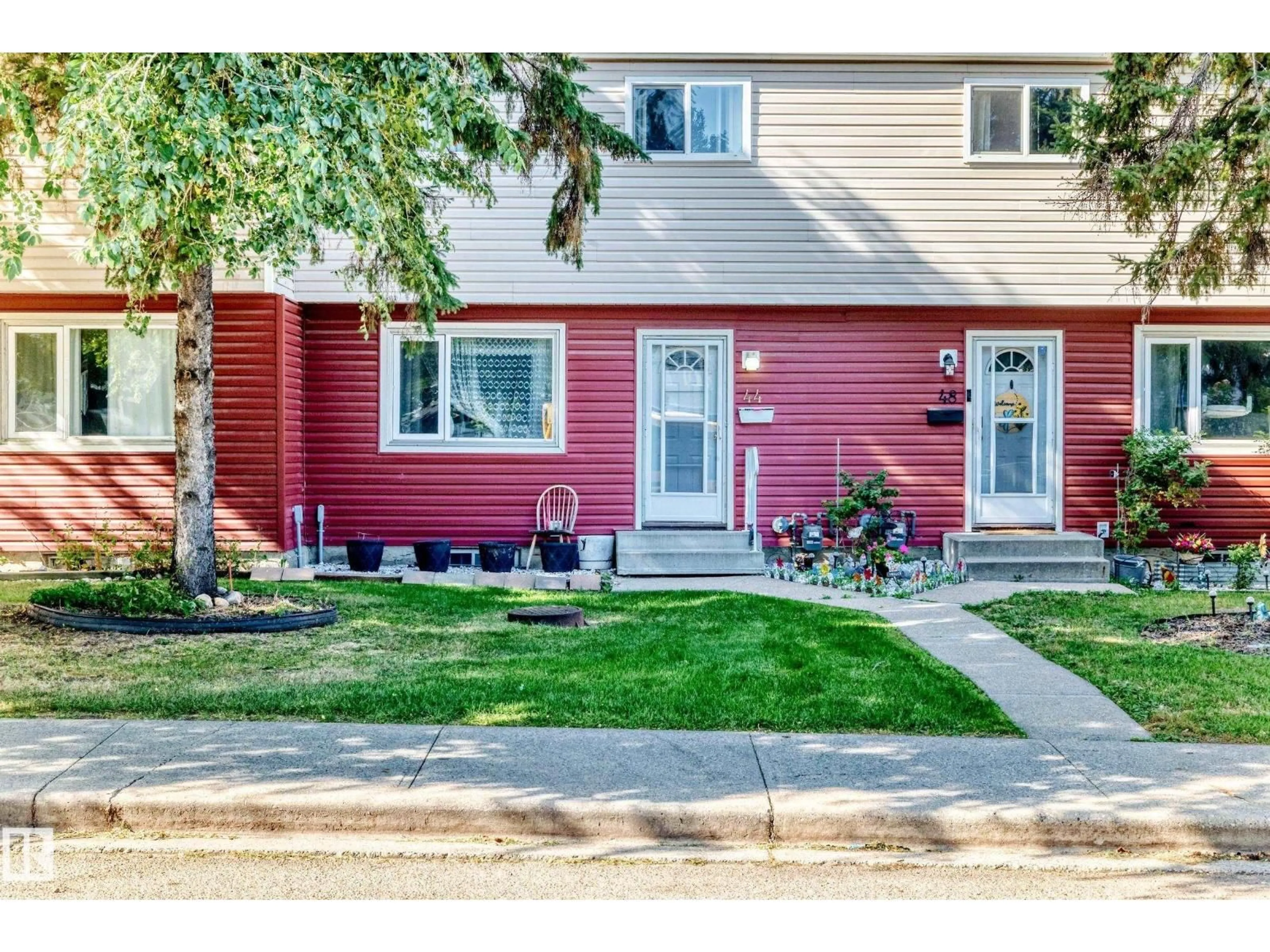 Home with vinyl exterior material, street for 44 HABITAT CR, Edmonton Alberta T5A2X7