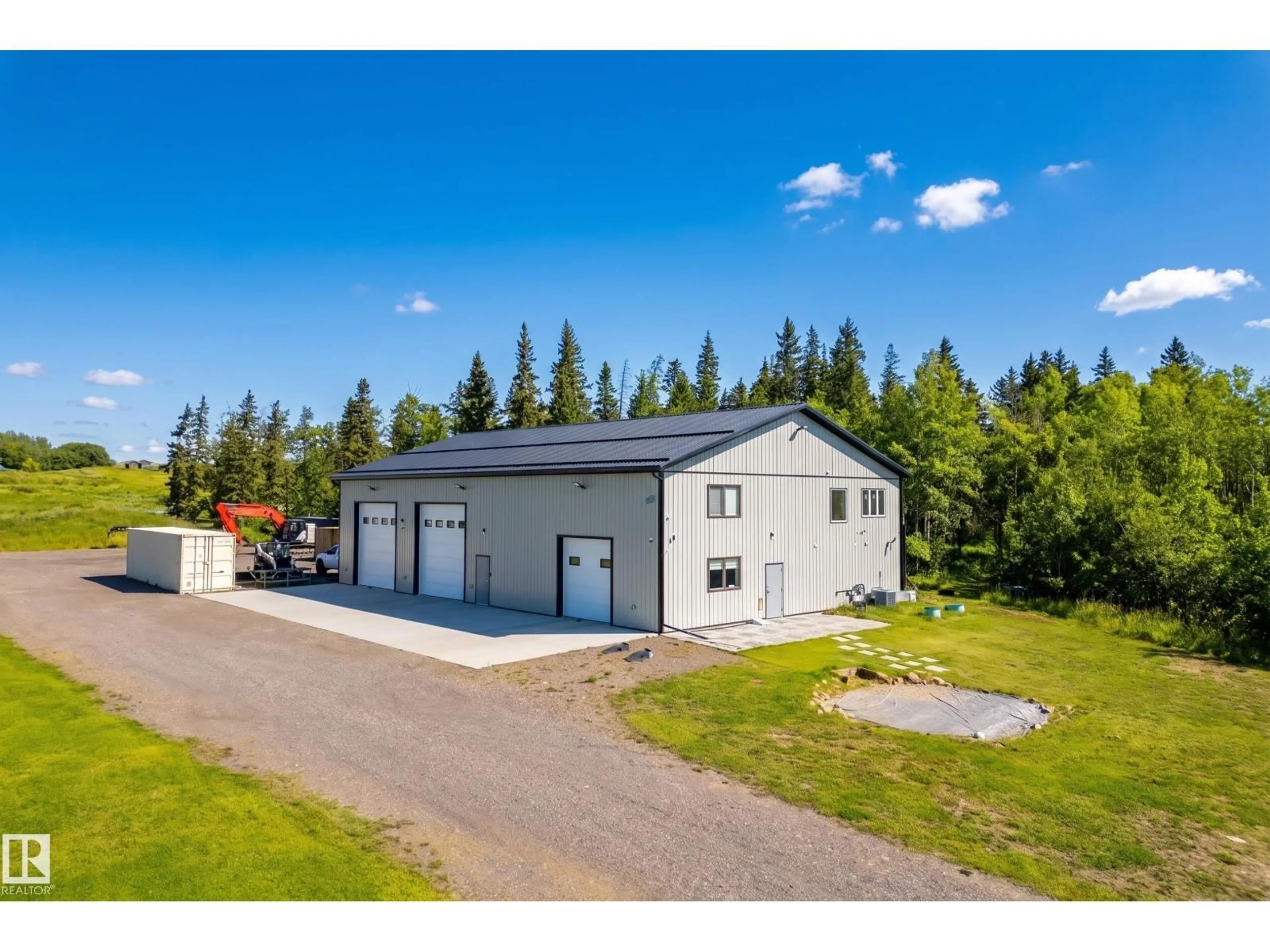 A pic from outside/outdoor area/front of a property/back of a property/a pic from drone, building for 49279 RGE RD 240, Rural Leduc County Alberta T4X0Z6